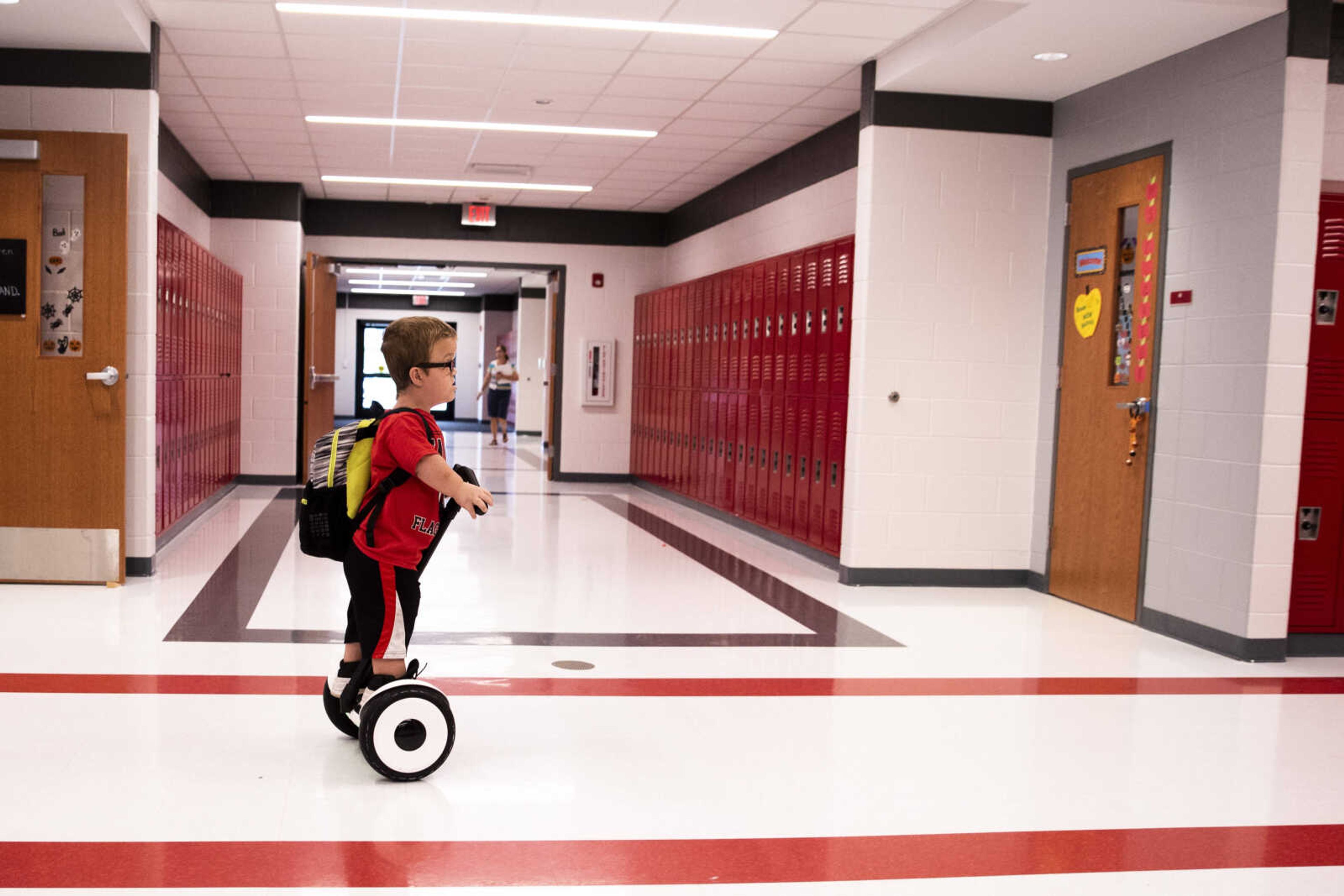 Izaac Pursley navigates his way through the halls of Jackson Middle School while riding his Segway to get to his next class Oct. 4, 2018, in Jackson.