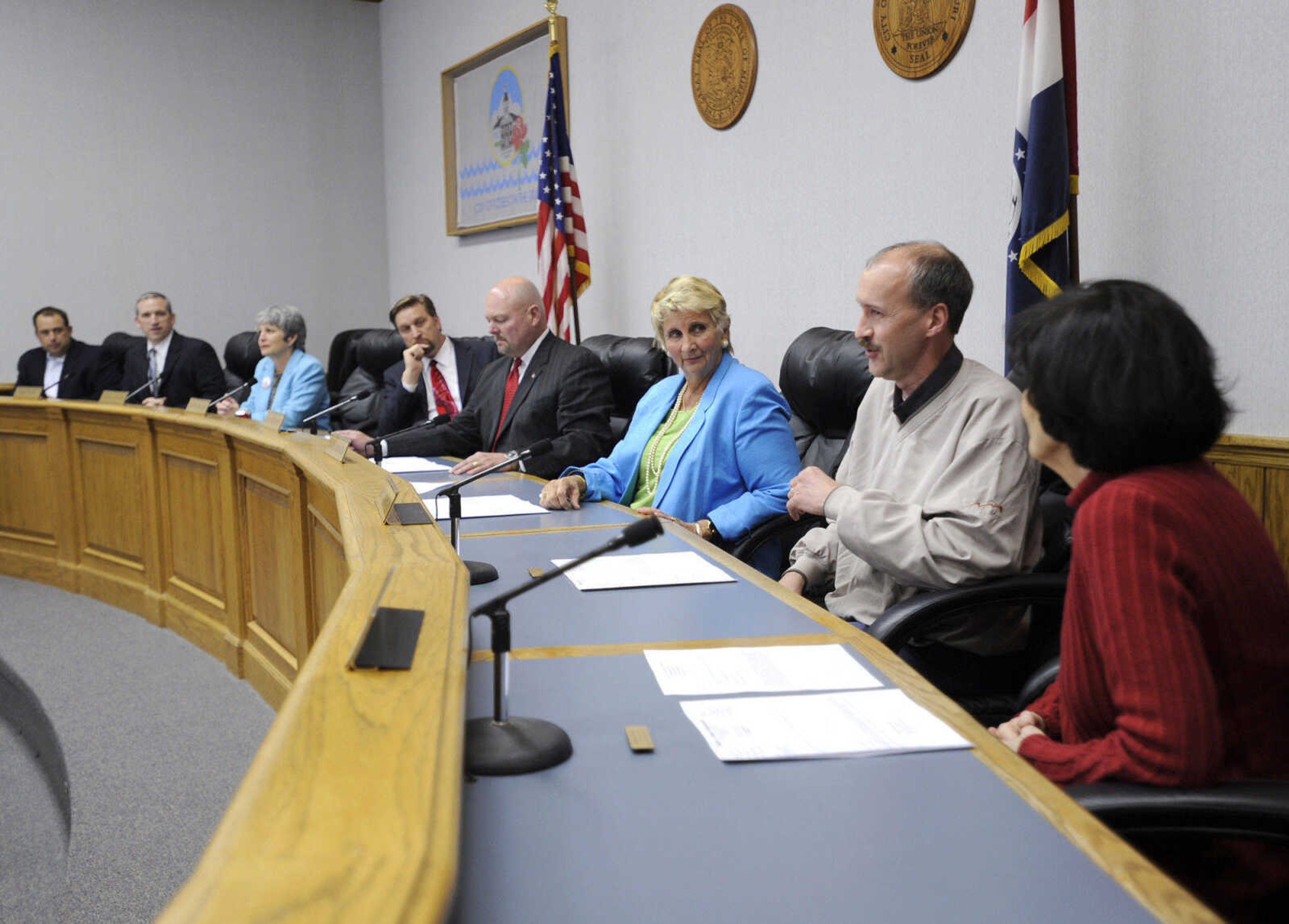 Councilman Charlie Herbst, second from right, speaks during the final minutes of his term on the Cape Girardeau city council on April 9, 2010.