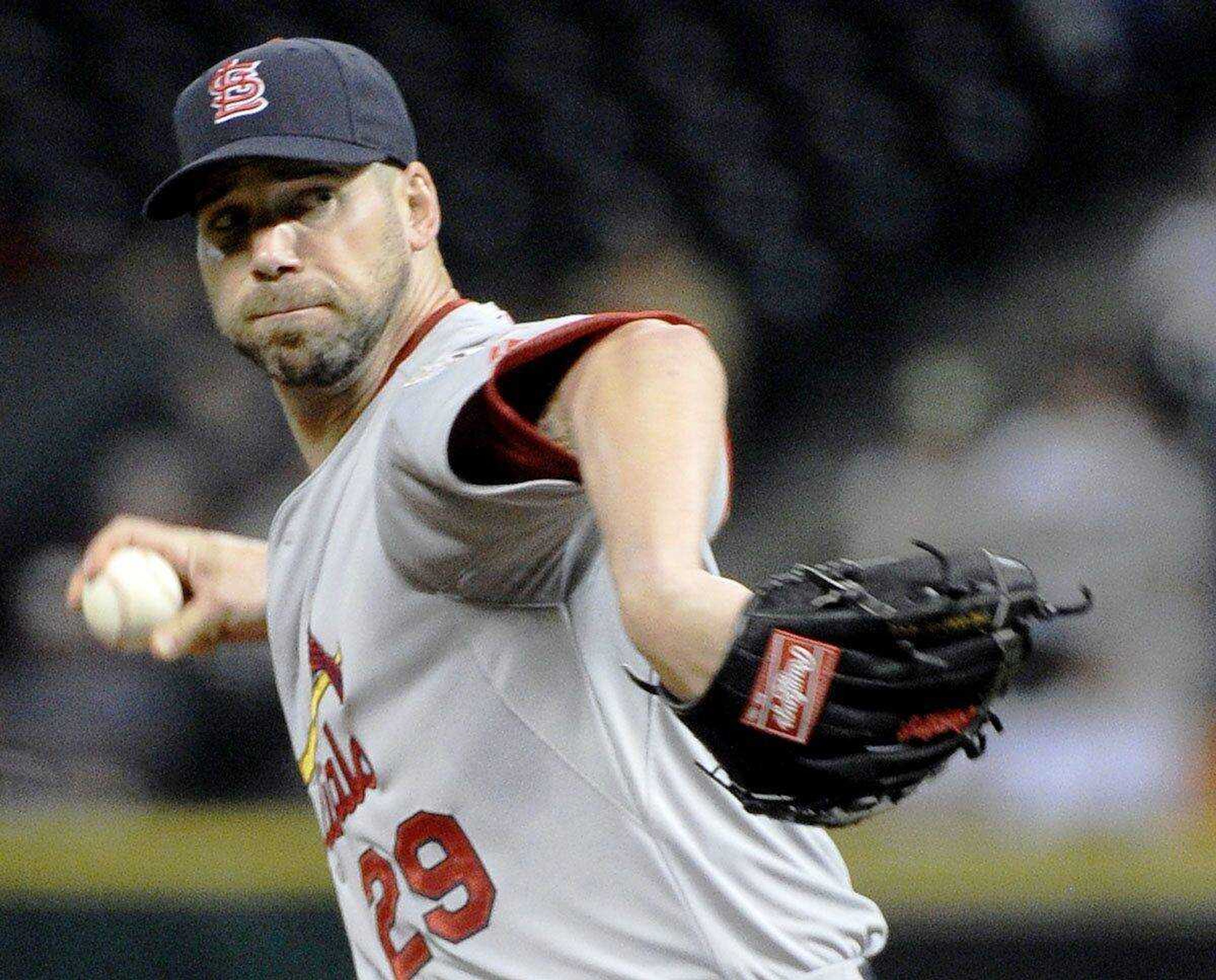 Cardinals starter Chris Carpenter delivers a pitch against the Astros during the first inning Wednesday in Houston.Pat SullivanAssociated Press