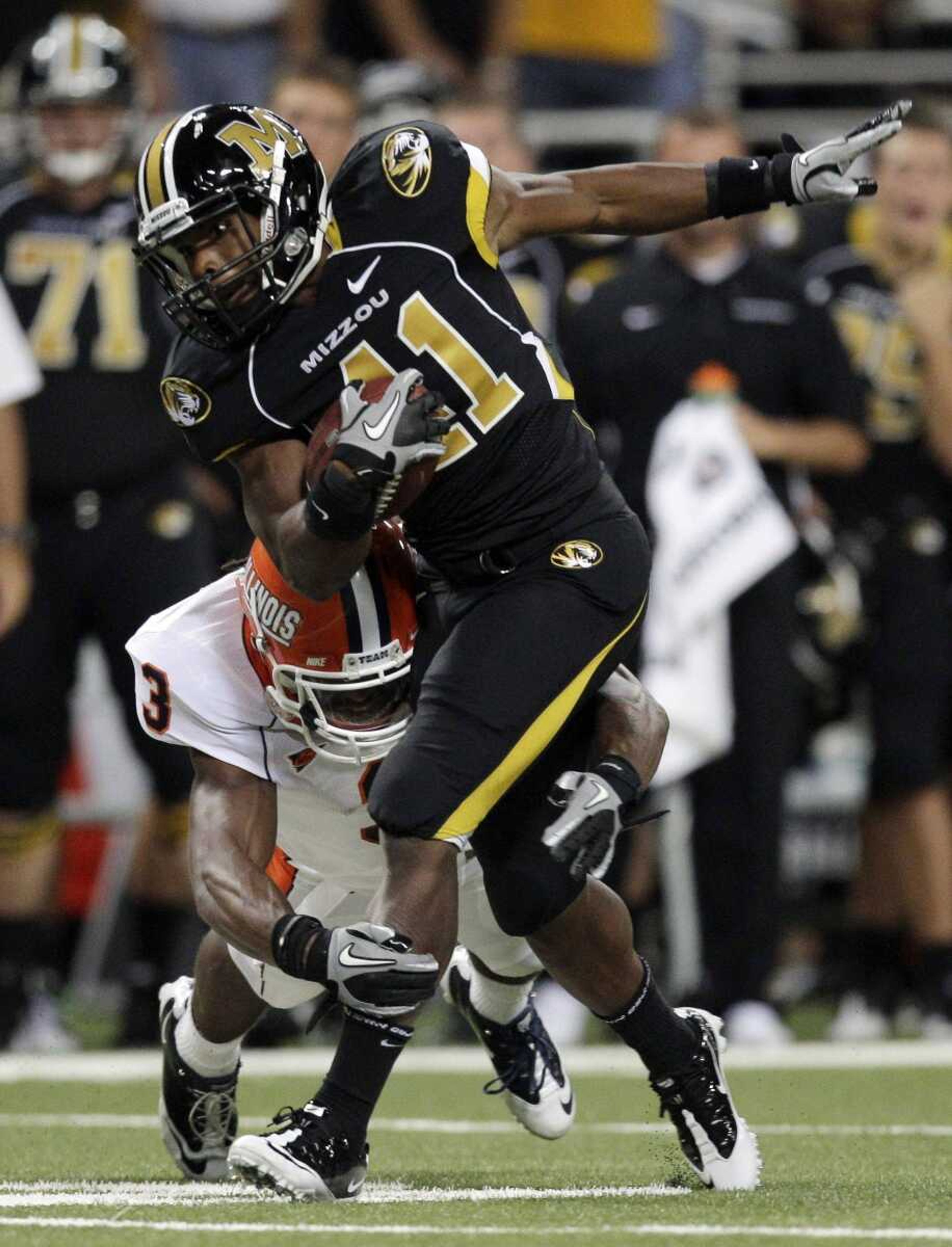 Missouri running back Henry Josey tries to avoid Illinois cornerback Tavon Wilson during the second quarter of their game earlier this month in St. Louis. (JEFF ROBERSON ~ Associated Press)