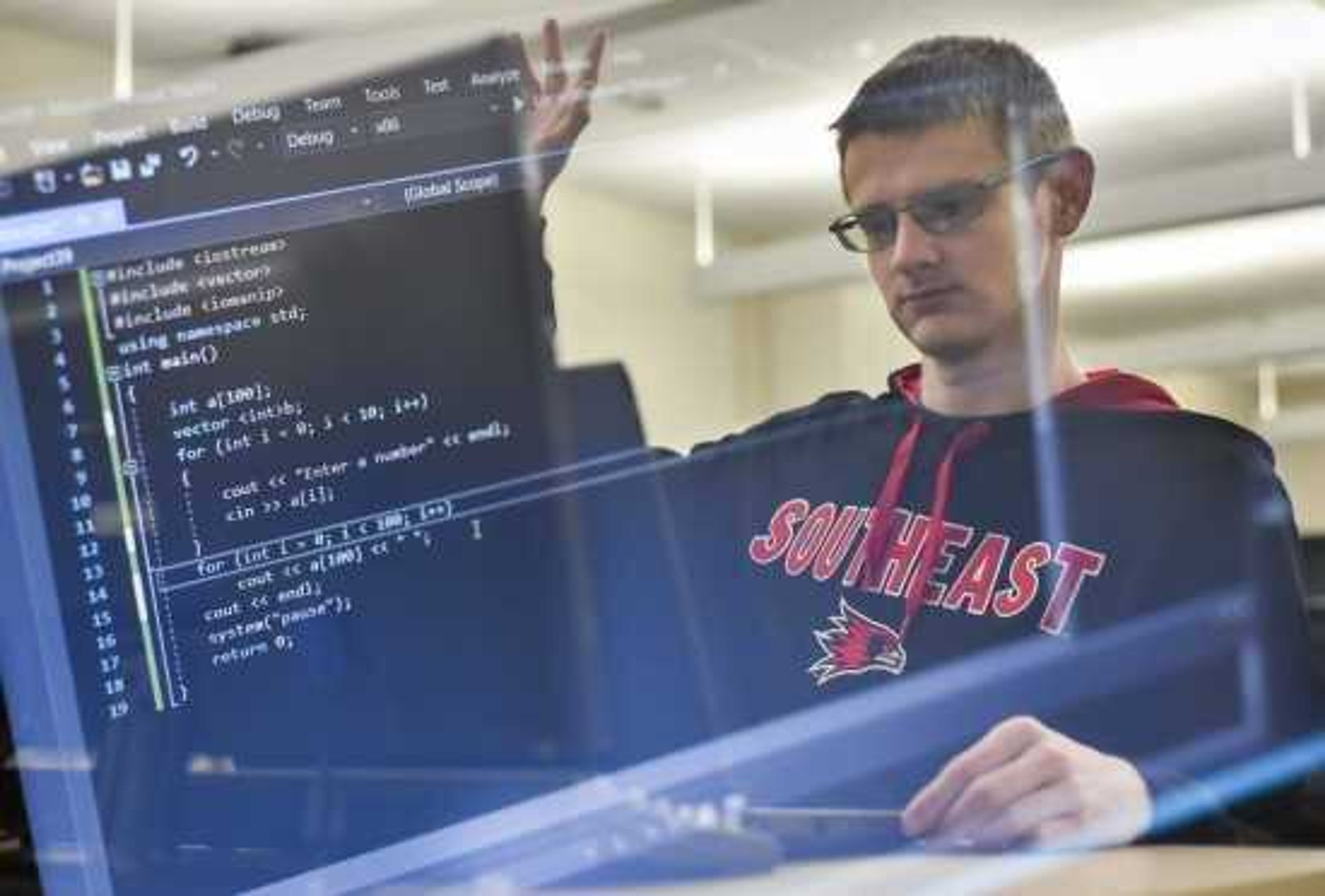 Southeast Missouri State University computer science student Graydon Haley-LeDure edits a line of code during a lab in this 2018 photo at Dempster Hall in Cape Girardeau.