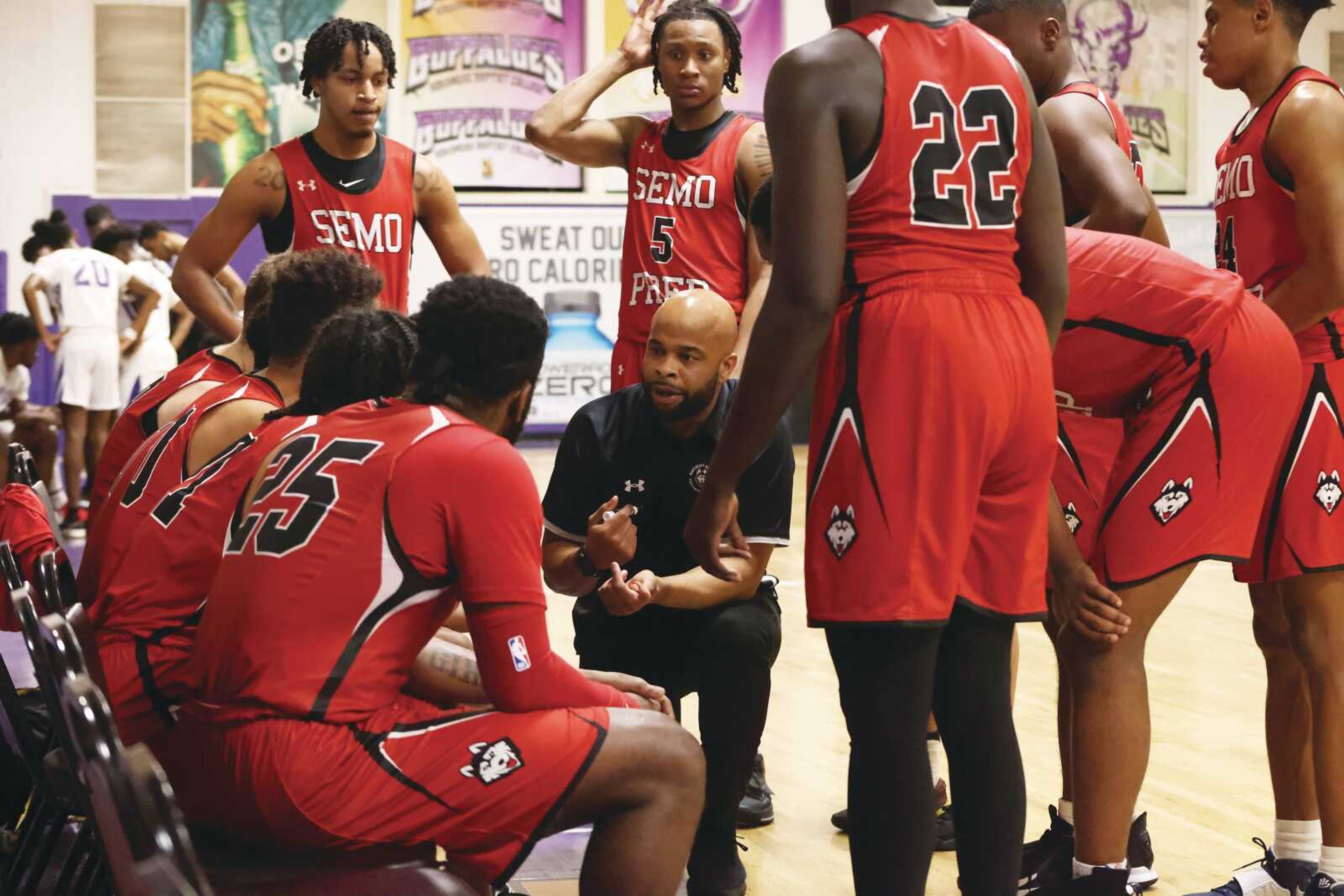 Roy Booker coaches his players during a game Dec. 9 at Arkansas Baptist Collage, in Little Rock, Arkansas.