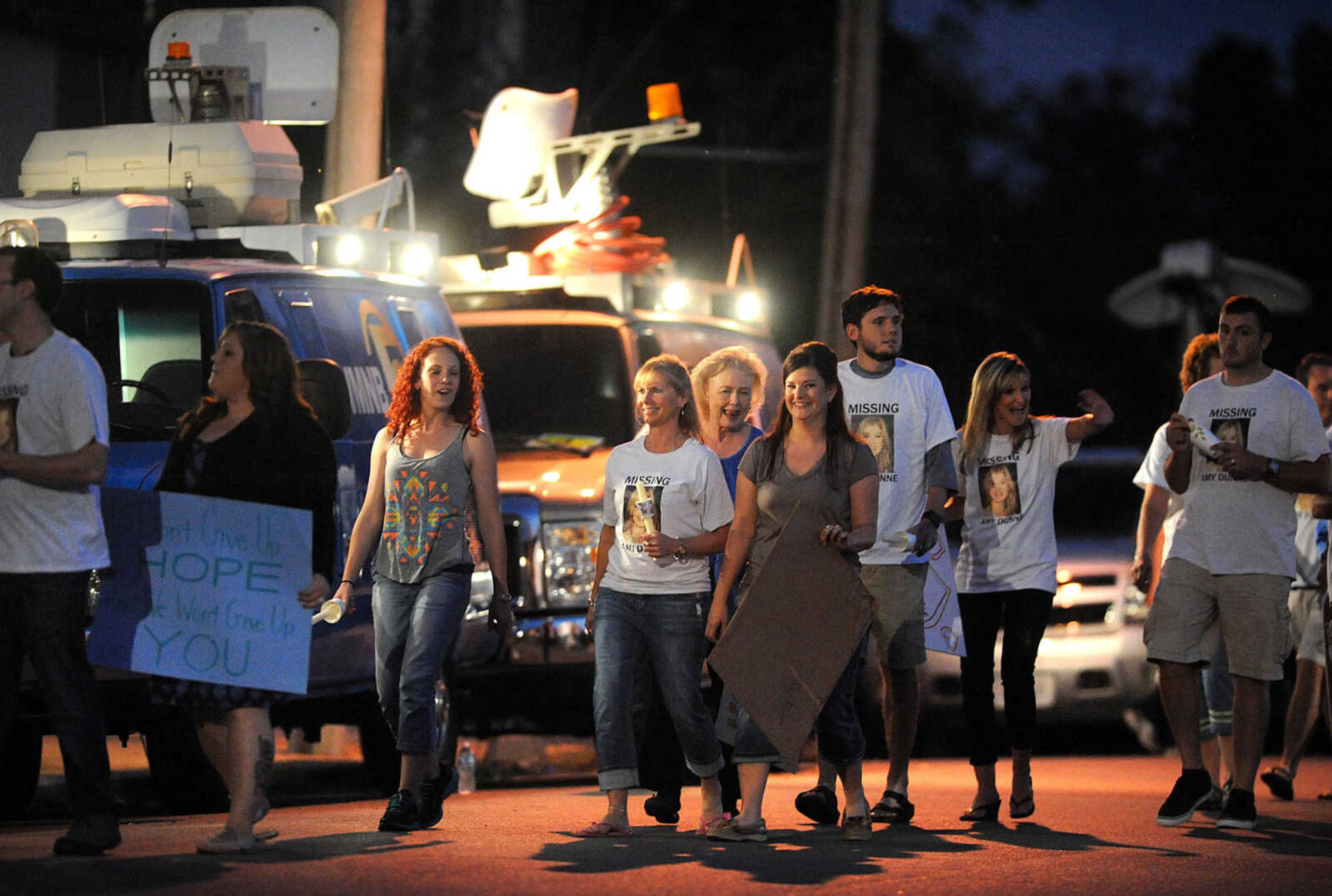 LAURA SIMON ~ lsimon@semissourian.com

Extras in 20th Century Fox's feature film "Gone Girl" head to the Common Pleas Courthouse, Thursday, Oct. 3, 2013, in Cape Girardeau.