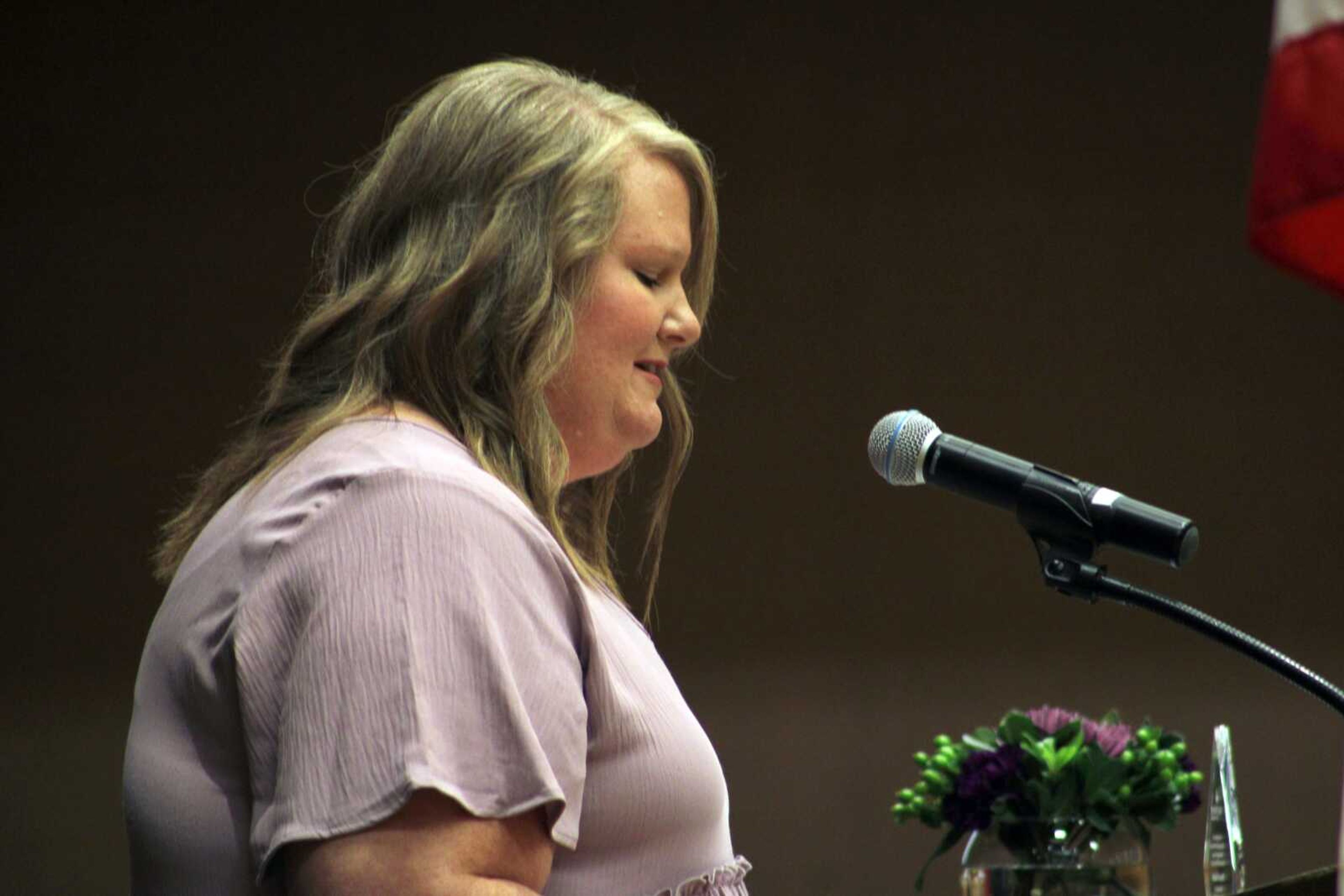 Kimberly Dixon, Safe House for Women shelter director, presents Distinguished Service Awards during the Safe House for Women 2021 luncheon and awards ceremony Friday at the Century Casino Cape Girardeau Event Center in downtown Cape Girardeau.