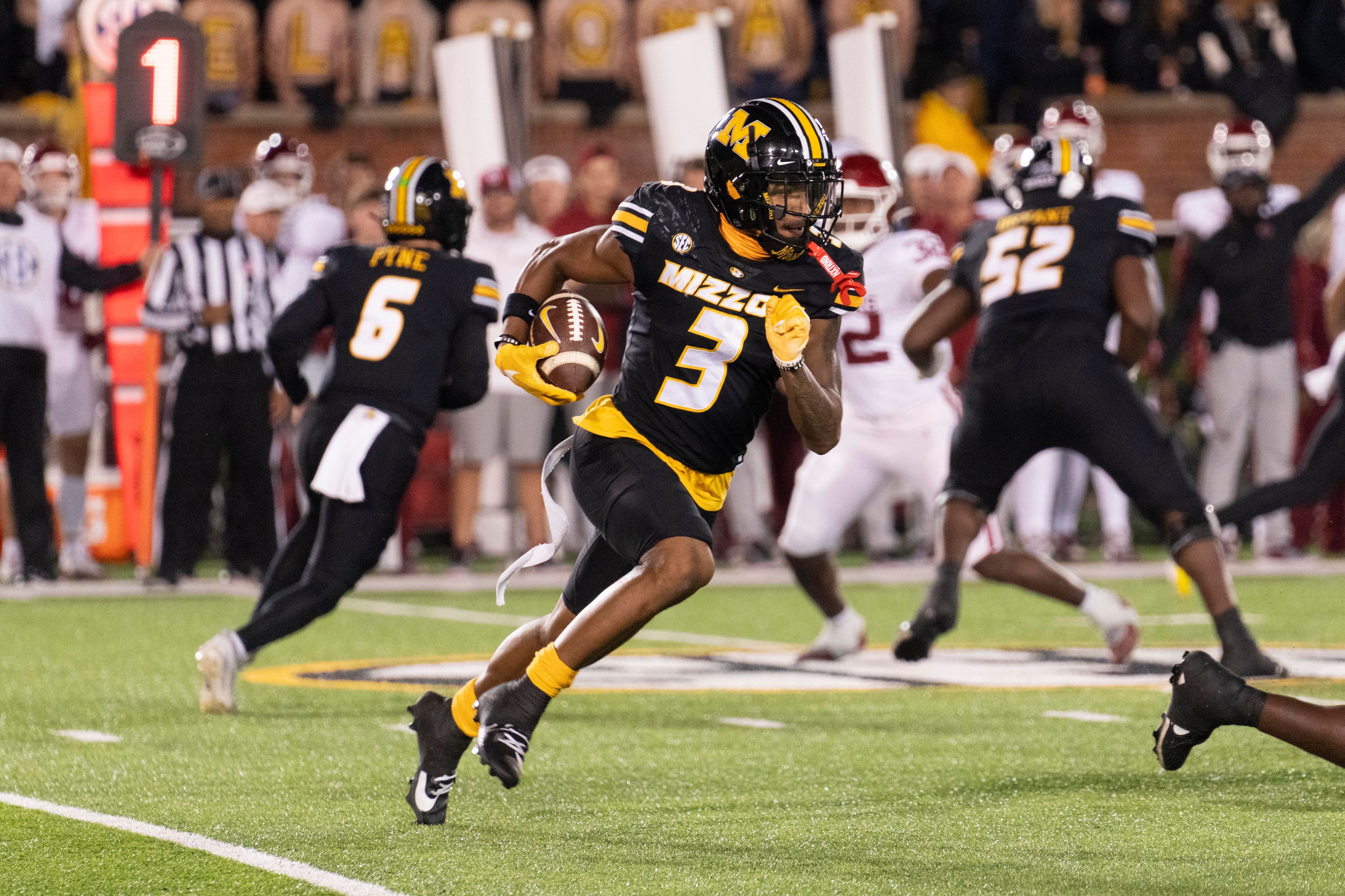 Missouri wide receiver Luther Burden III (3) runs the ball during the first half of an NCAA college football game against Oklahoma Saturday, Nov. 9, 2024, in Columbia, Mo. (AP Photo/L.G. Patterson)