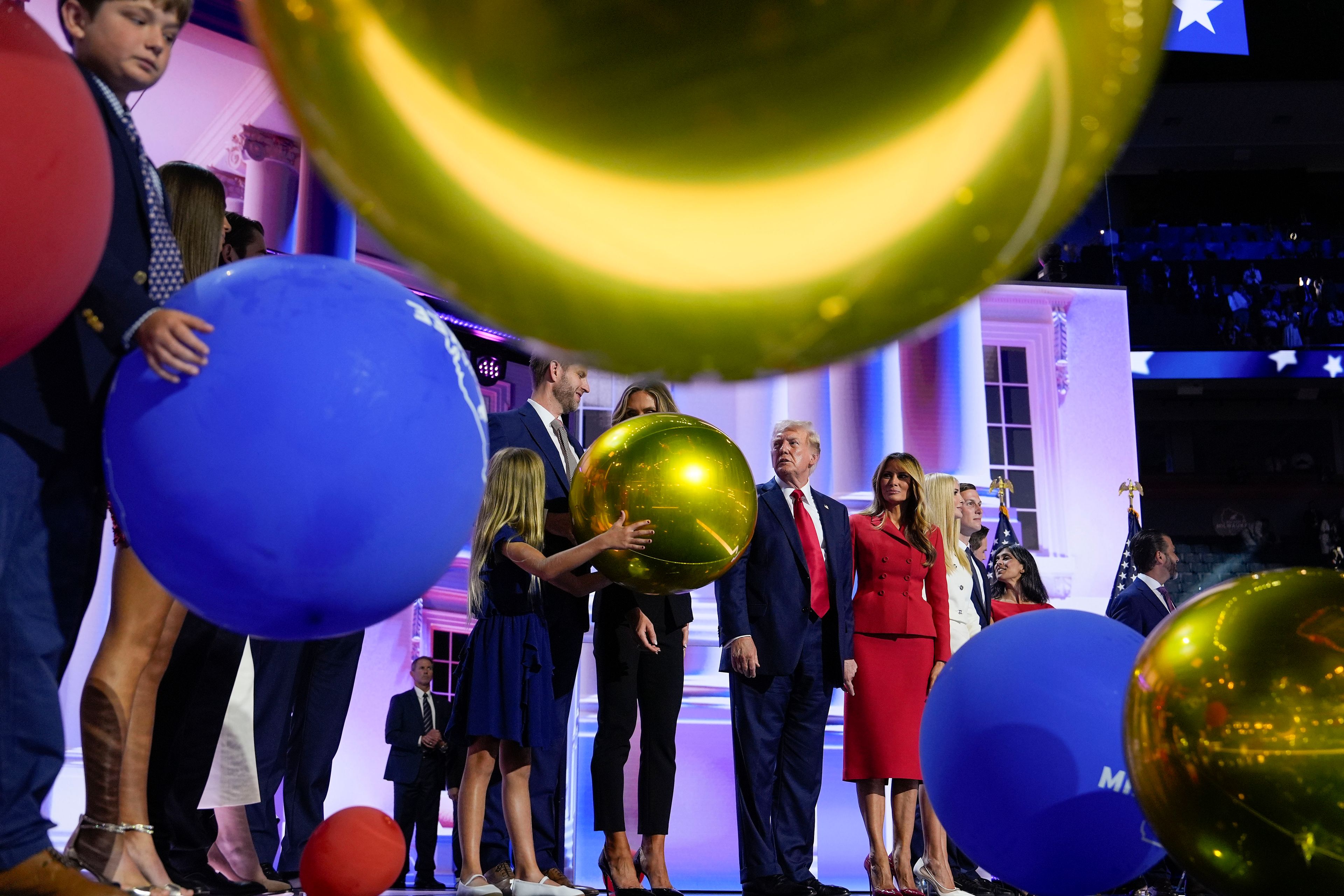 FILE - Republican presidential candidate former President Donald Trump, center, stands on stage with Melania Trump and other members of his family during the Republican National Convention, July 18, 2024, in Milwaukee. (AP Photo/Julia Nikhinson, File)