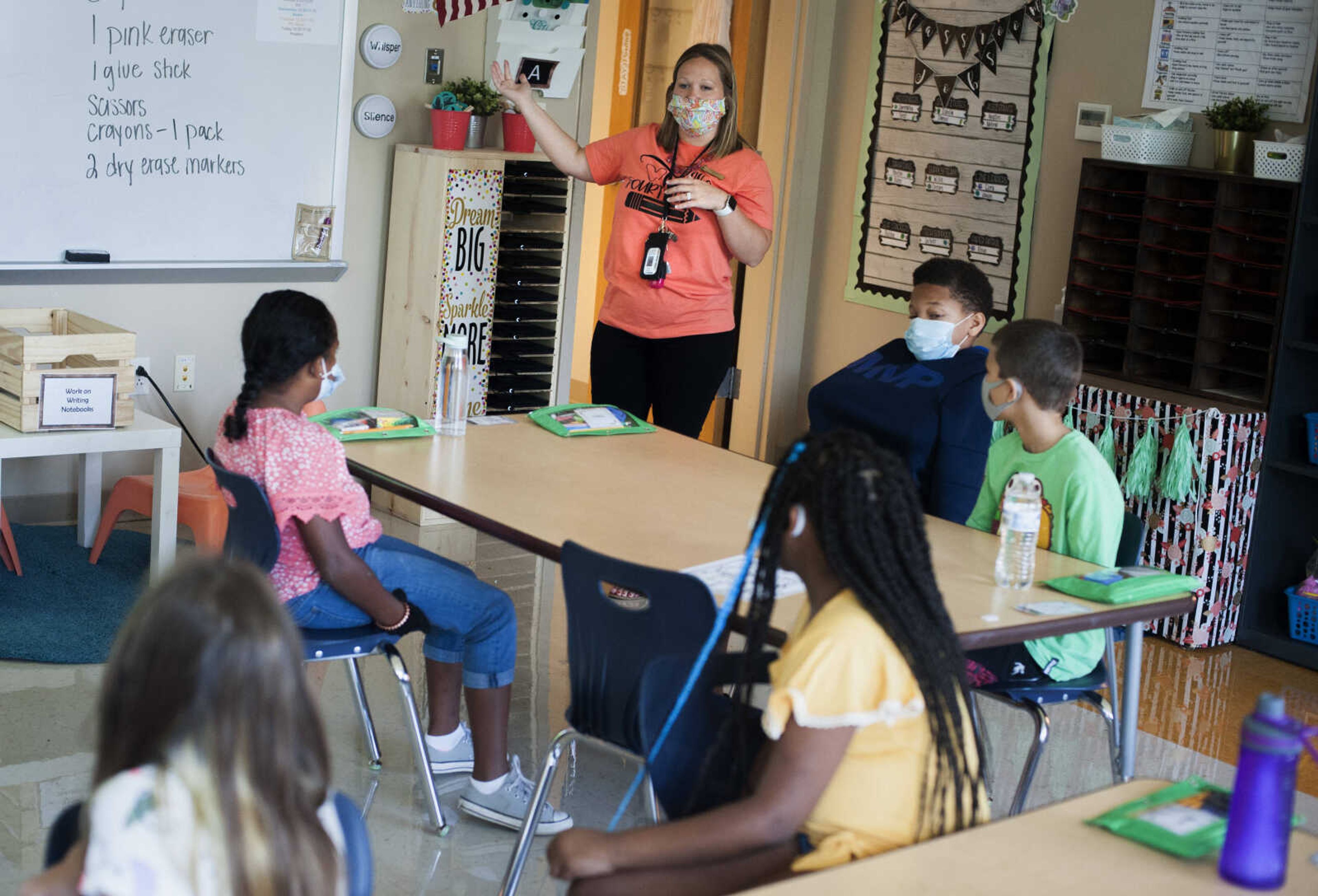 Franklin Elementary School fourth grade teacher Taylor Glueck gives her students a tour of their new classroom Monday, Aug. 24, 2020, in Cape Girardeau.