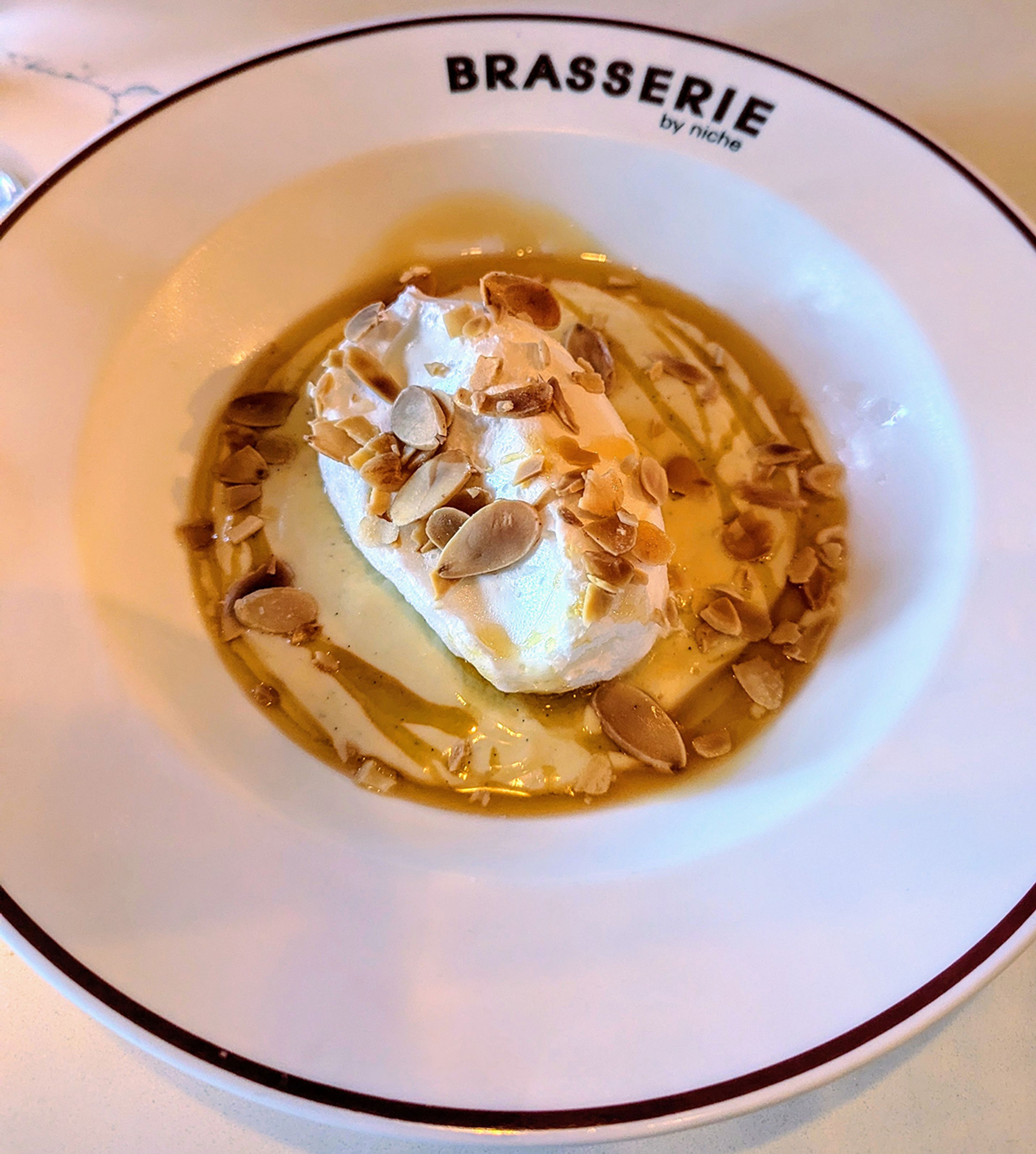 The Floating Island, a classic French dessert, as served at Brasserie by Niche in St. Louis.
