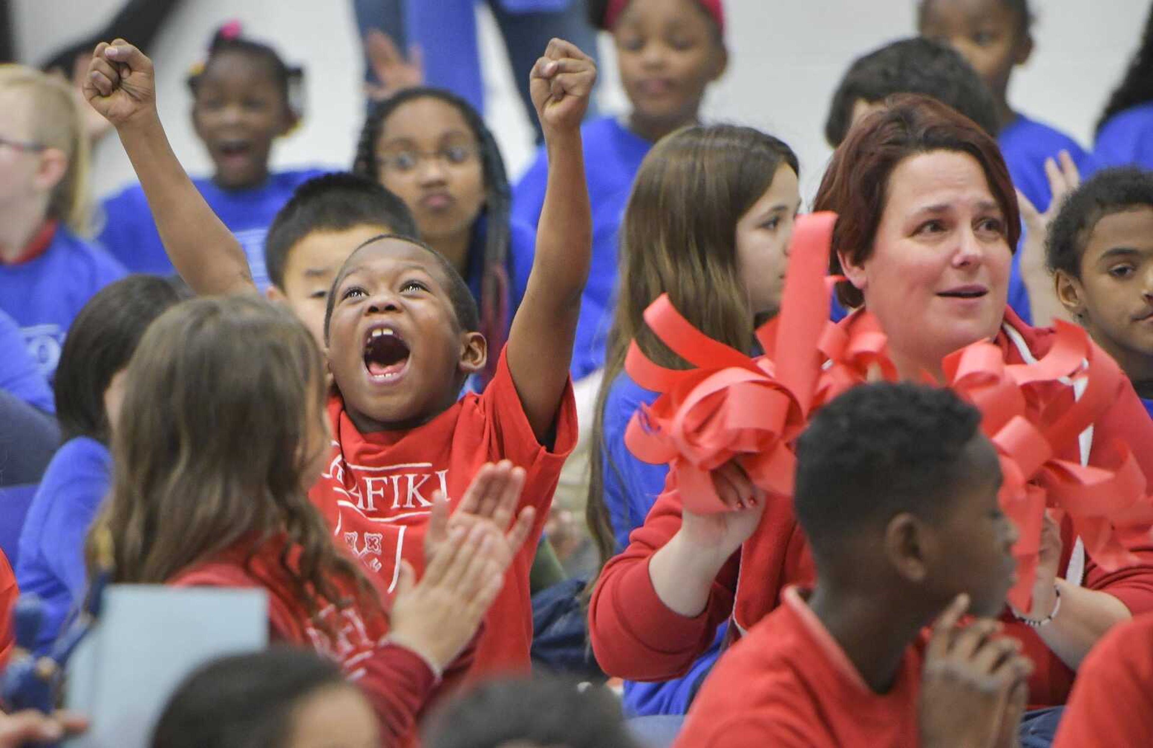 K'morian Dodds, 7, screams with delight as "House Urafiki" is recognized during a celebratory assembly for the four "houses" of the student body Friday, Jan. 10, 2020, at Franklin Elementary in Cape Girardeau. Urafiki, which is Swahili for friendship, and the other three houses are part of a program to promote leadership and teamwork among Franklin students.