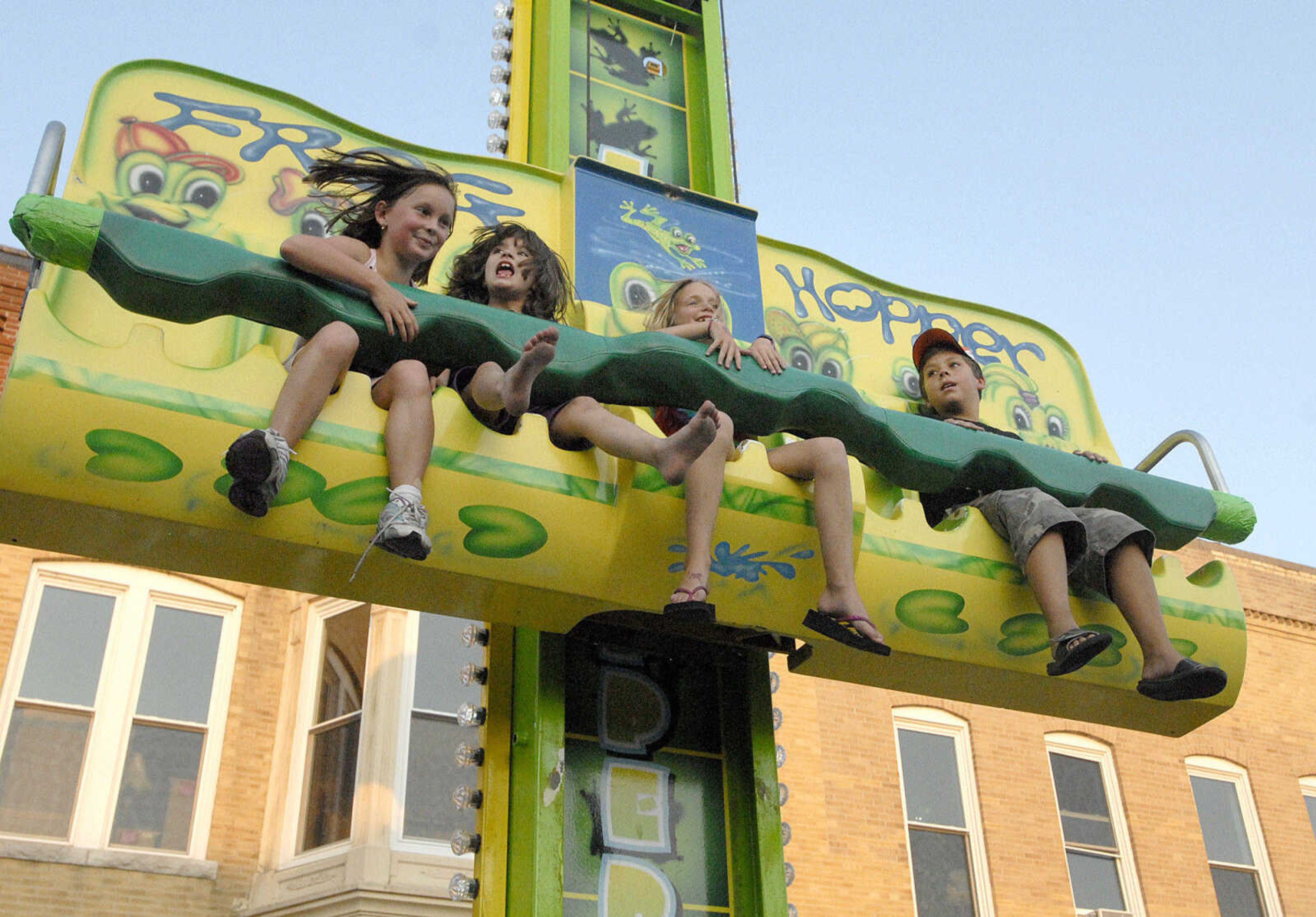 LAURA SIMON ~ lsimon@semissourian.com
The Frog Hopper takes children for a ride Wednesday, July 27, 2011 during Jackson Homecomers.