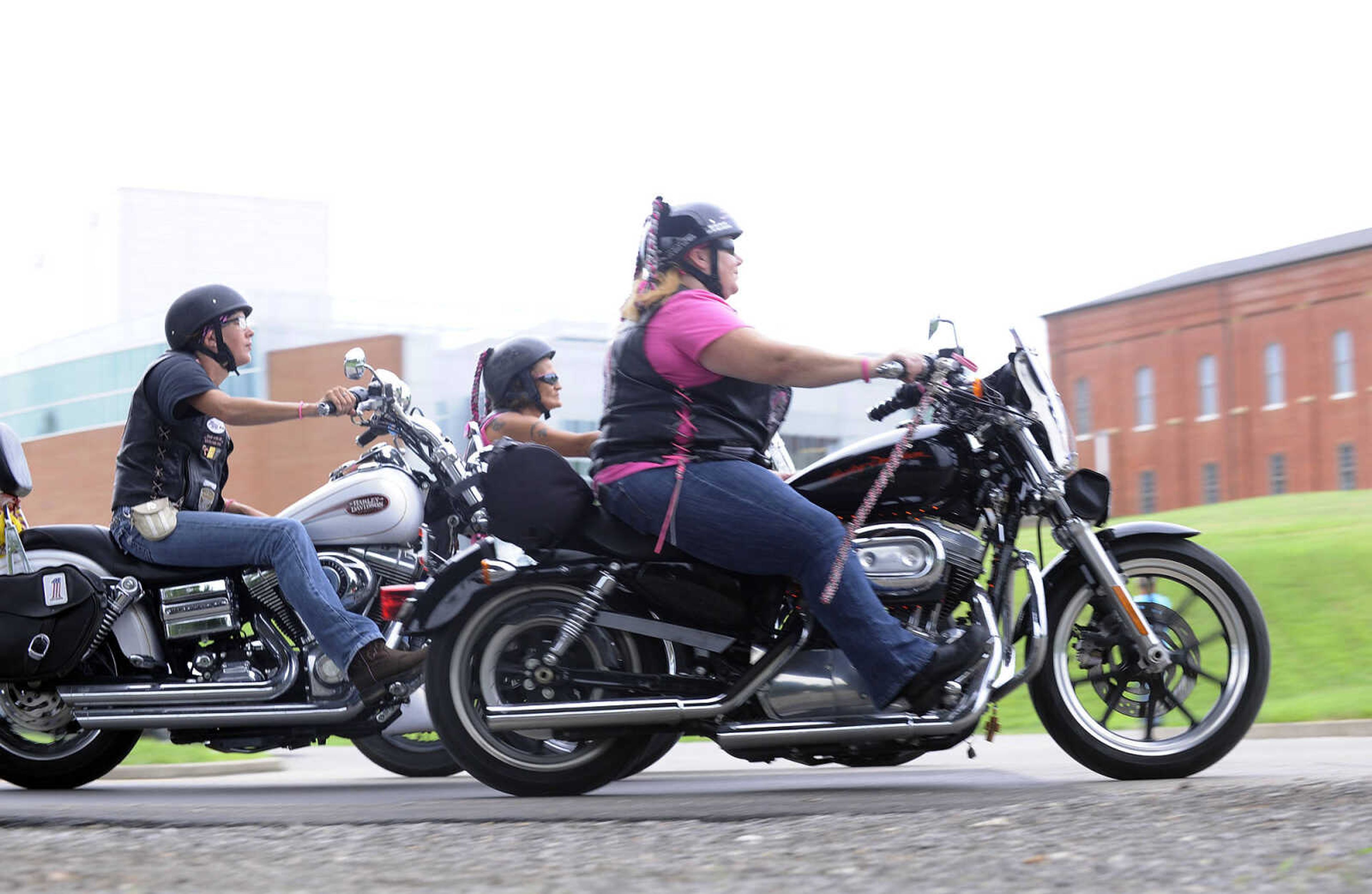 LAURA SIMON ~ lsimon@semissourian.com

The Chrome Queens cruise down Aquamsi Street in Cape Girardeau on Thursday, Aug. 18, 2016.