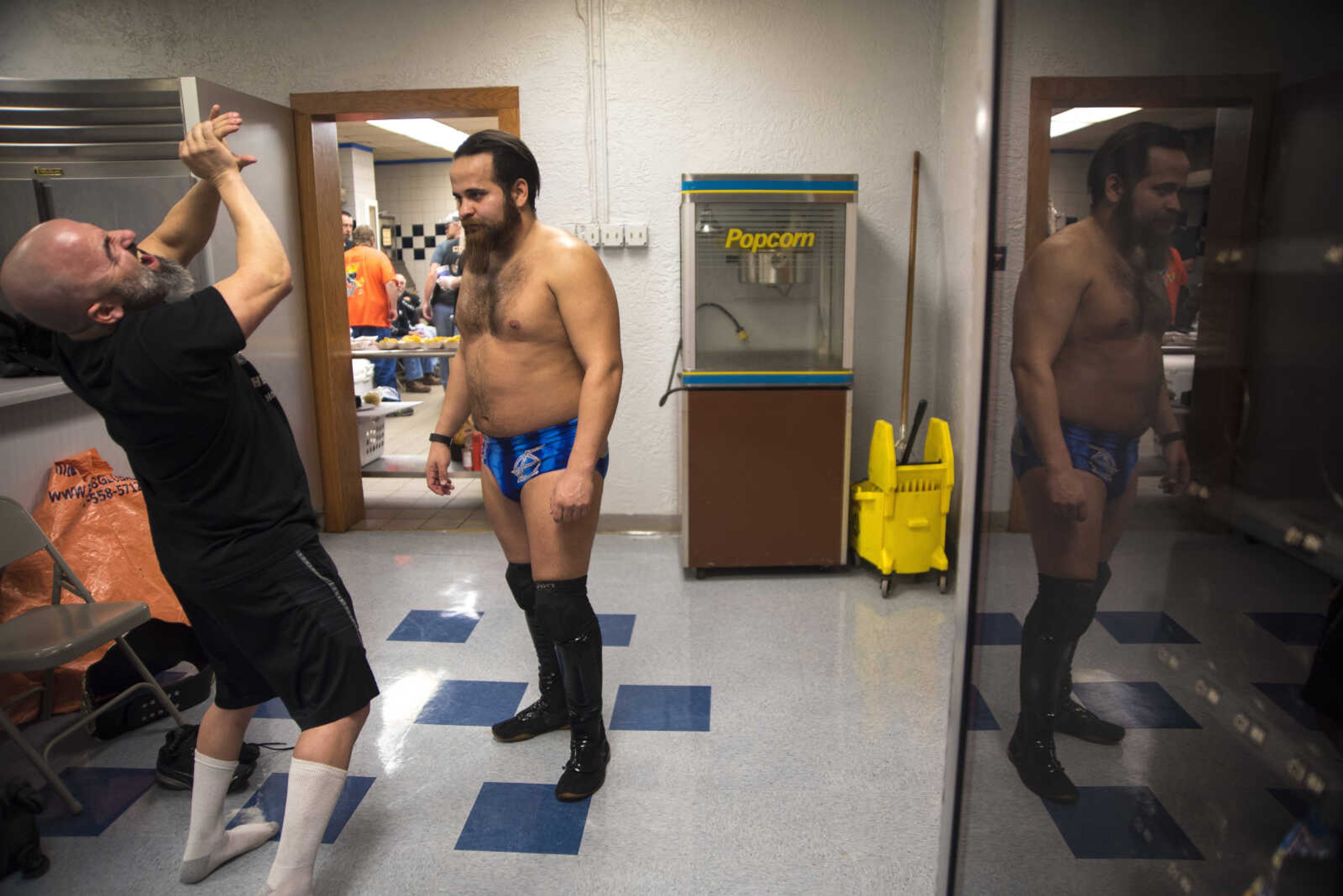 Tony Kozina and Brandon Espinosa prepare before the Cape Championship Wrestling match Saturday, Jan. 28, 2017 at the Arena Building in Cape Girardeau.