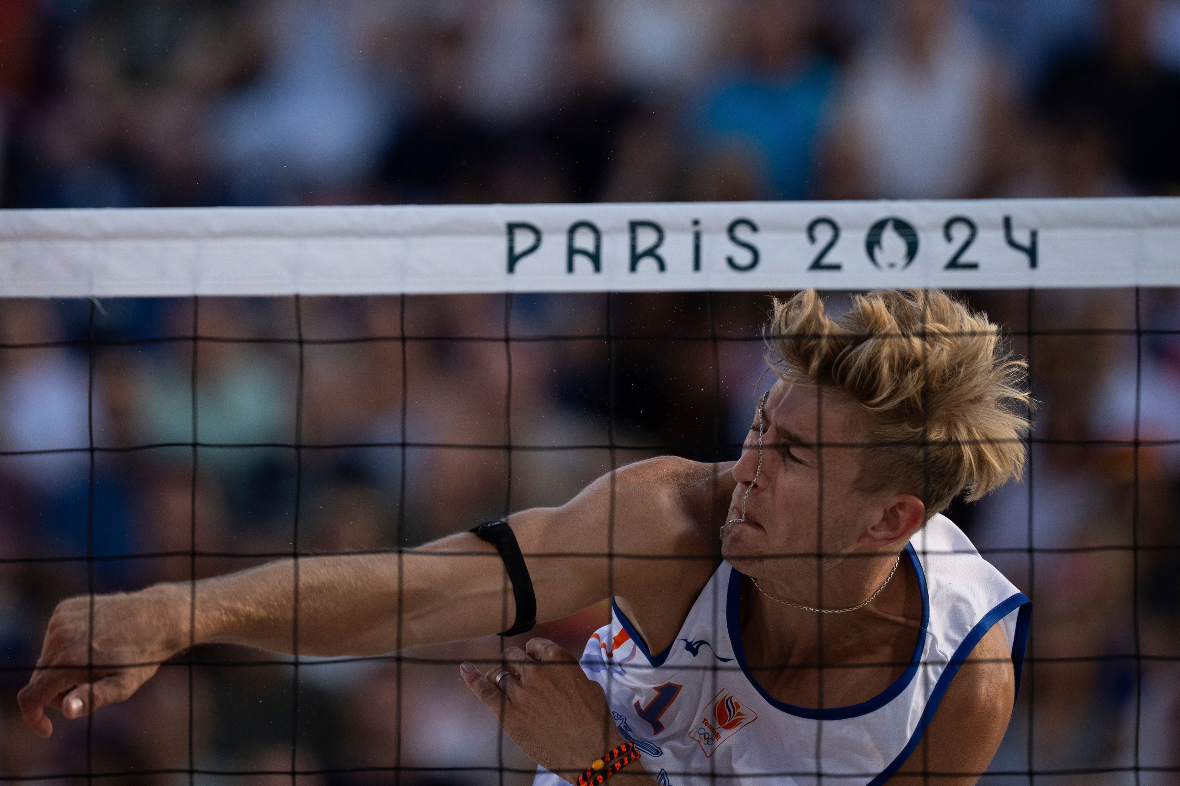 Netherlands' Steven Van De Velde hits the ball during the men's pool B beach volleyball match between Norway and Netherlands at Eiffel Tower Stadium at the 2024 Summer Olympics, Friday, Aug. 2, 2024, in Paris, France. (AP Photo/Louise Delmotte)