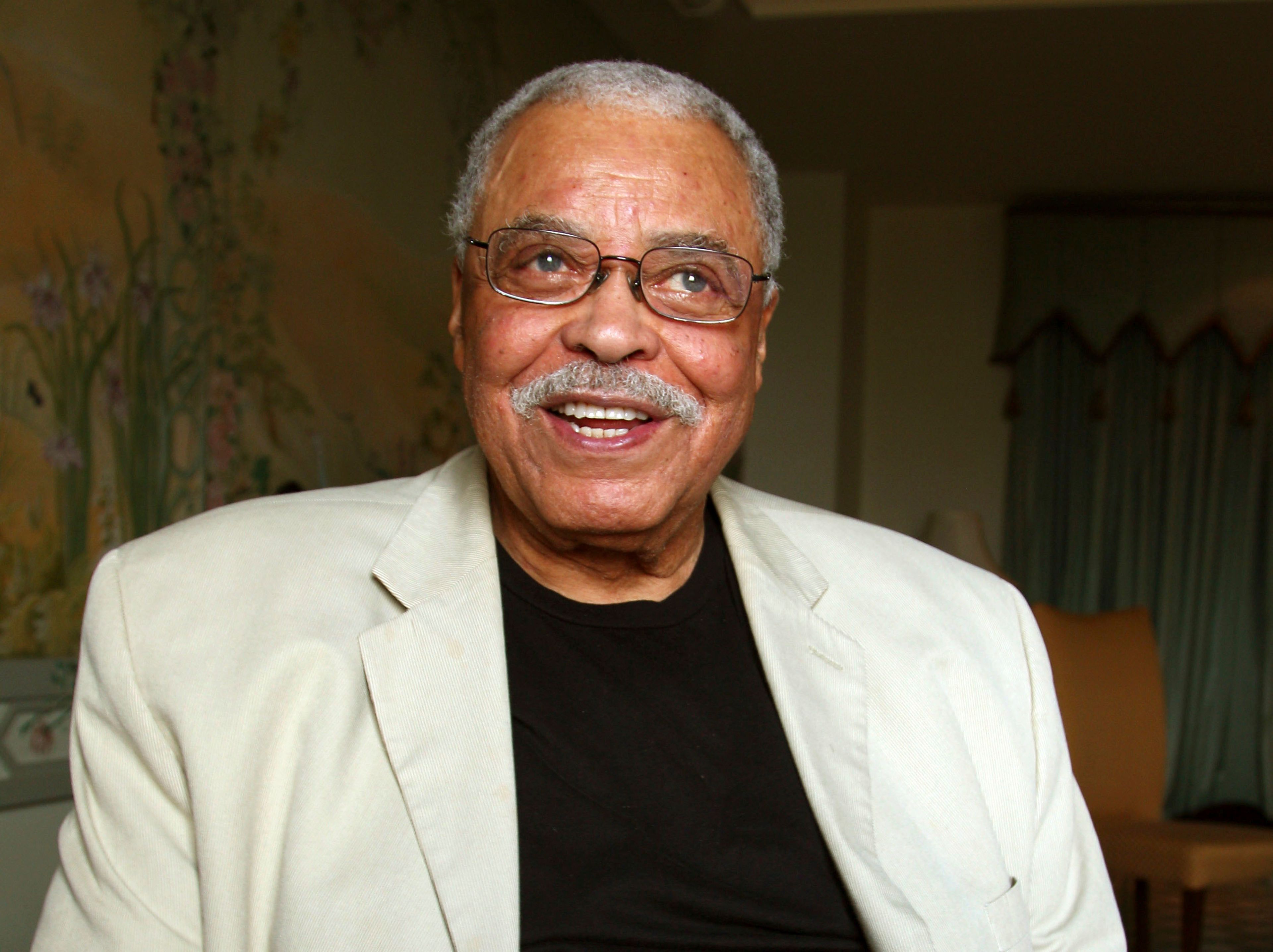 FILE - Actor James Earl Jones poses for photos in Sydney, Australia, Jan. 7, 2013. Jones, who overcame racial prejudice and a severe stutter to become a celebrated icon of stage and screen has died at age 93, Monday, Sept. 9, 2024. (AP Photo/Rick Rycroft, File)