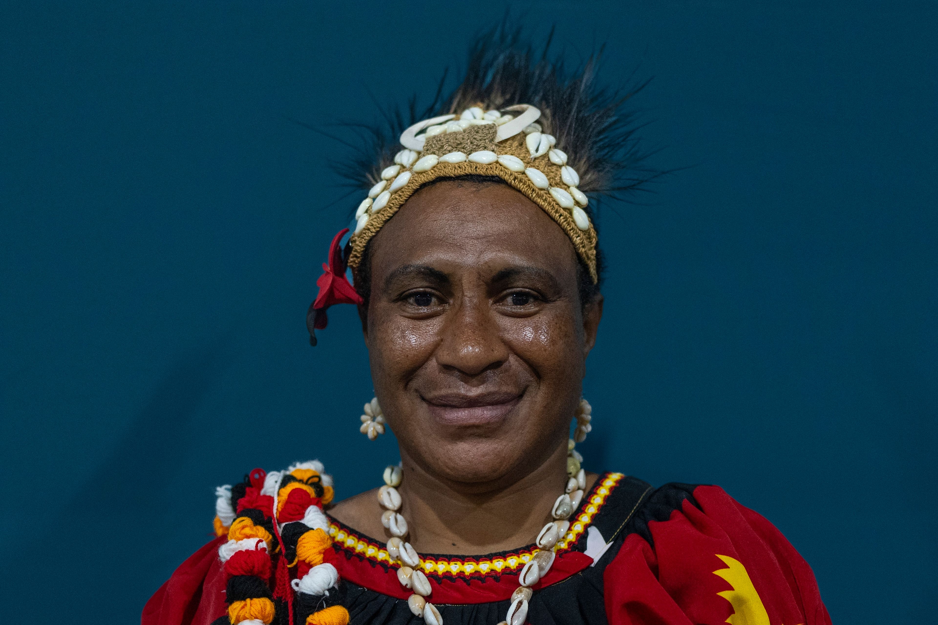 Marynne Rimbao, 42, of Unda village, Papua New Guinea, from the Tombekin community, poses for a photo during the COP29 U.N. Climate Summit, Thursday, Nov. 14, 2024. in Baku, Azerbaijan. (AP Photo/Rafiq Maqbool)