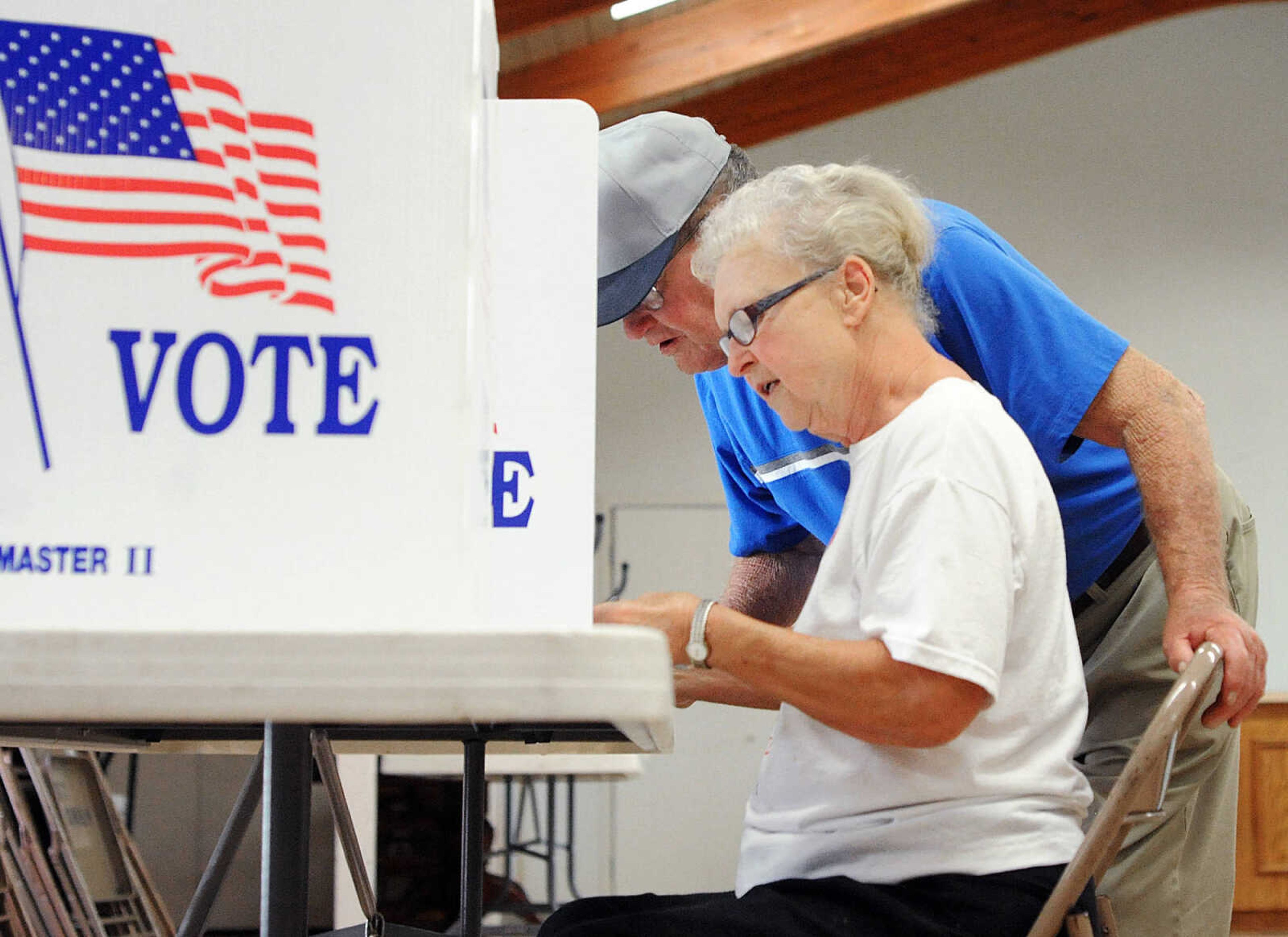 Barbara and John Yallaly cast their ballots at St. Andrew Lutheran Church in Cape Girardeau during Tuesday's primary election. (Laura Simon)