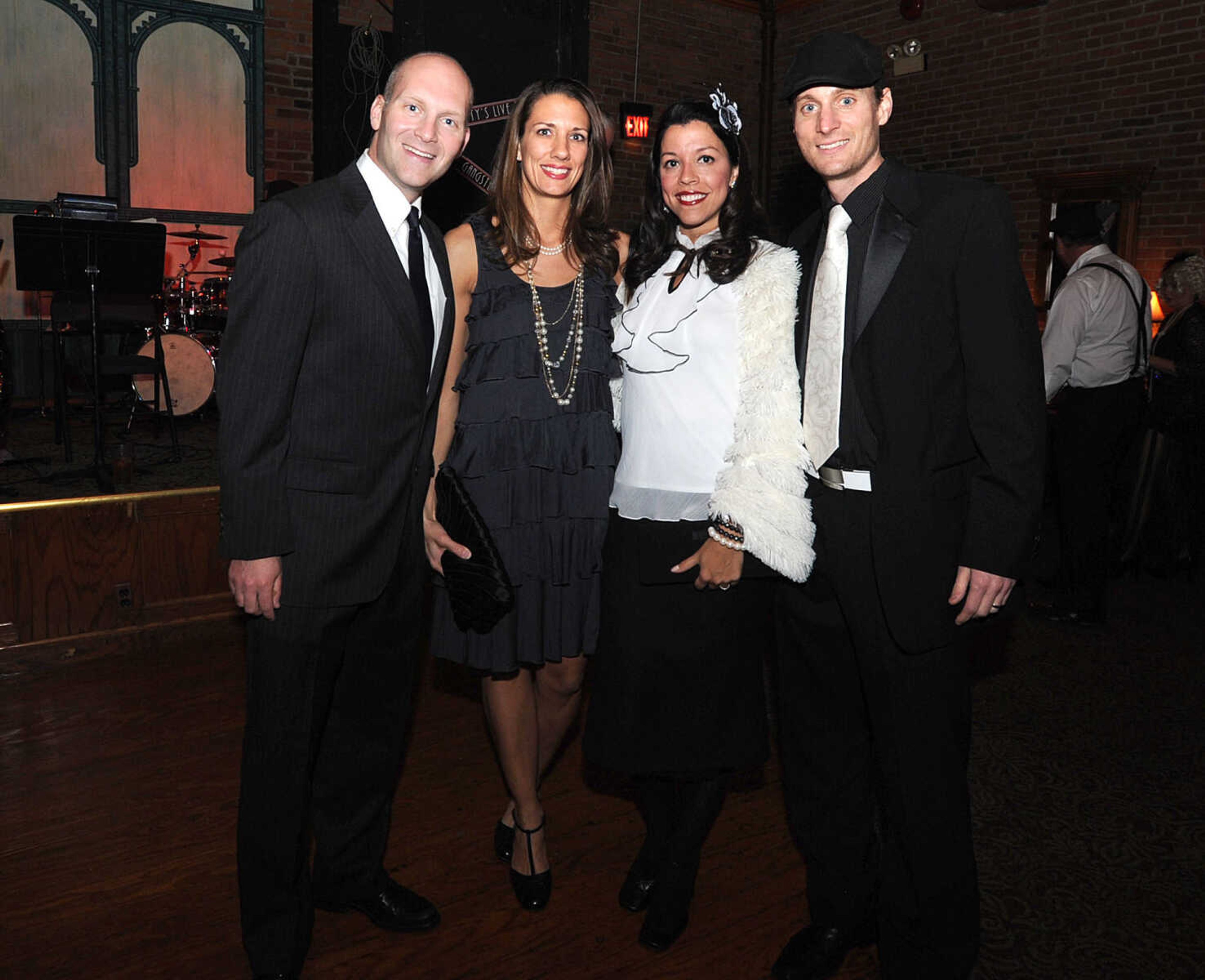 LAURA SIMON ~ lsimon@semissourian.com
Matt and Judee Gaeta, and Brenna and Brent Keller pose for a photo Friday, Nov. 30, 2012 during CASA's Speakeasy Soiree at Port Cape's Yacht Club in Cape Girardeau.