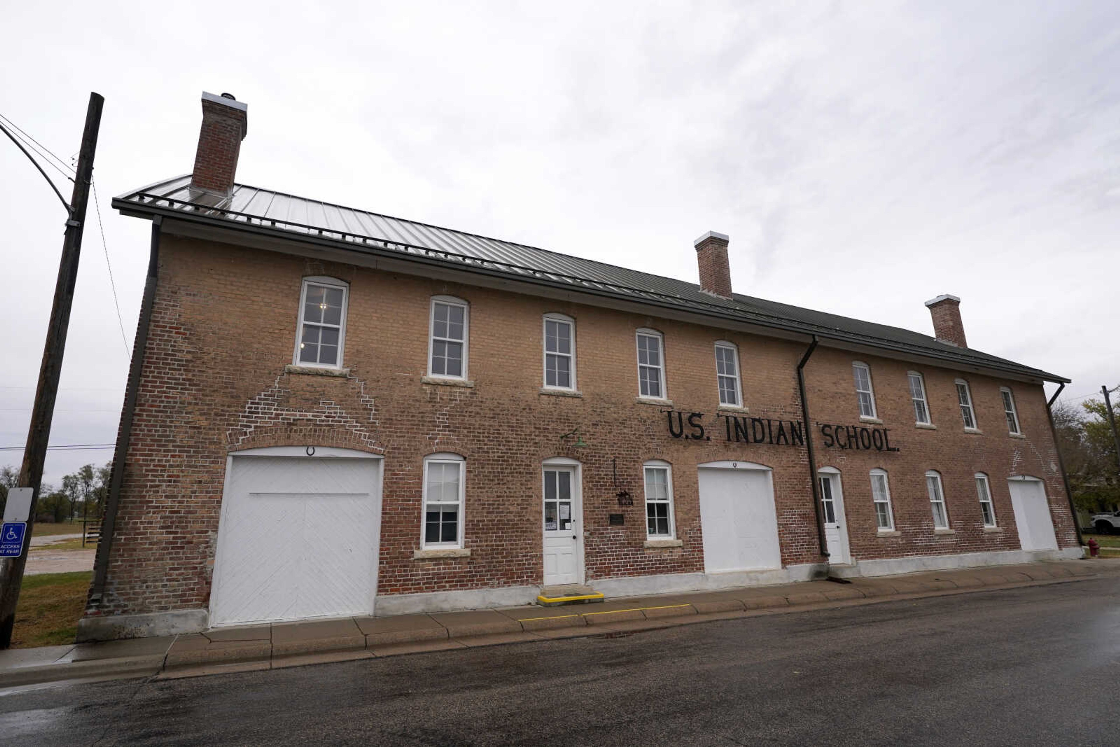 The museum building at the former Genoa Indian Industrial School on Oct. 27 in Genoa, Nebraska. For decades the location of the student cemetery, where more than 80 Native American children are buried, has been a mystery, lost over time after the school closed in 1931 and memories faded of the once-busy campus that sprawled over 640 acres in the tiny community of Genoa. Archeologists started to dig Monday to find the bodies of the children.