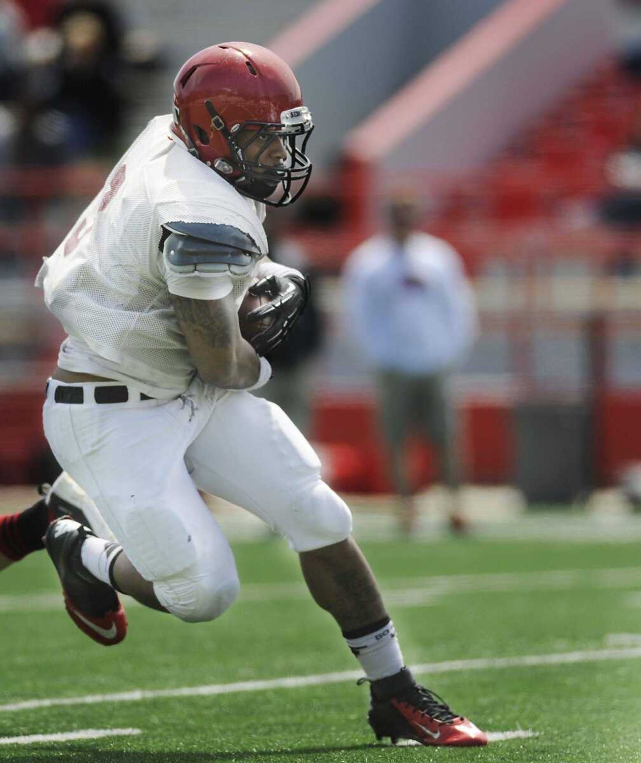 Southeast Missouri State running back Lennies McFerren carries the ball during a scrimmage Saturday at Houck Stadium.