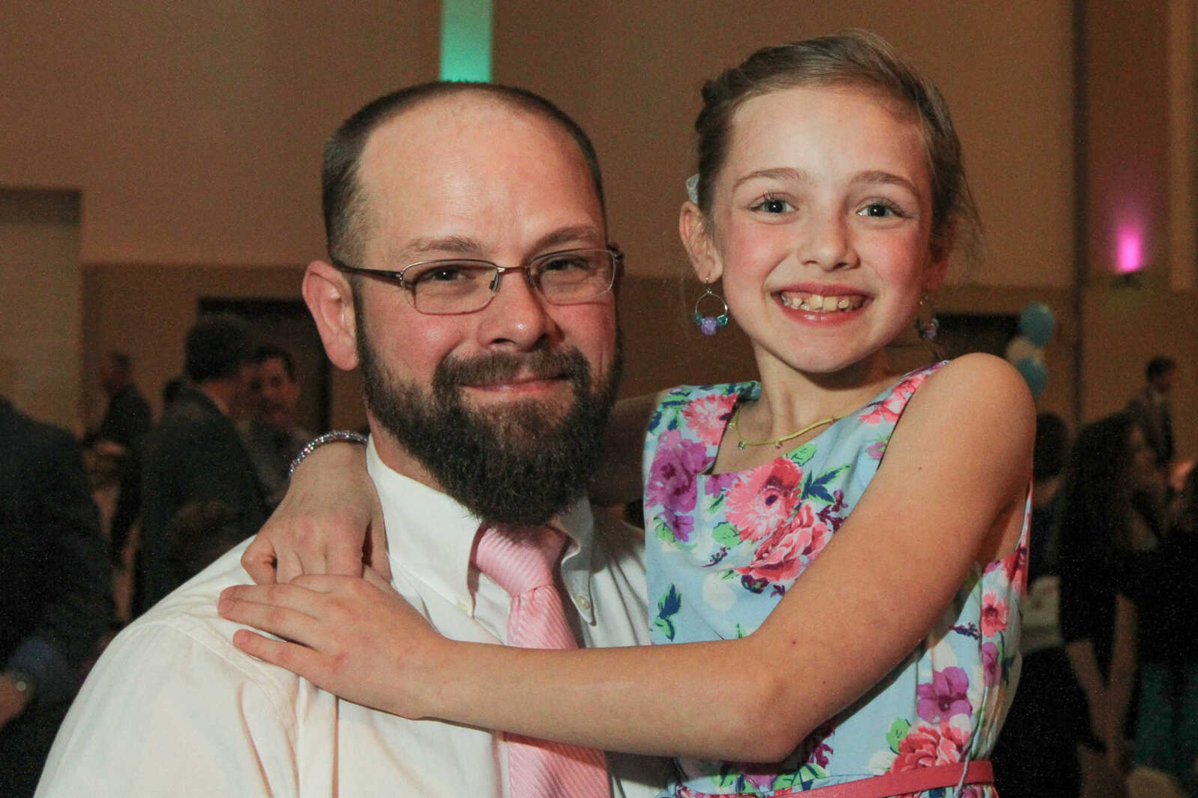 GLENN LANDBERG ~ glandberg@semissourian.com

Vivian Vance and her father Aaron pose for a photo during the 7th annual Father/Daughter Dance Saturday, Feb. 21, 2015 at the Osage Centre.