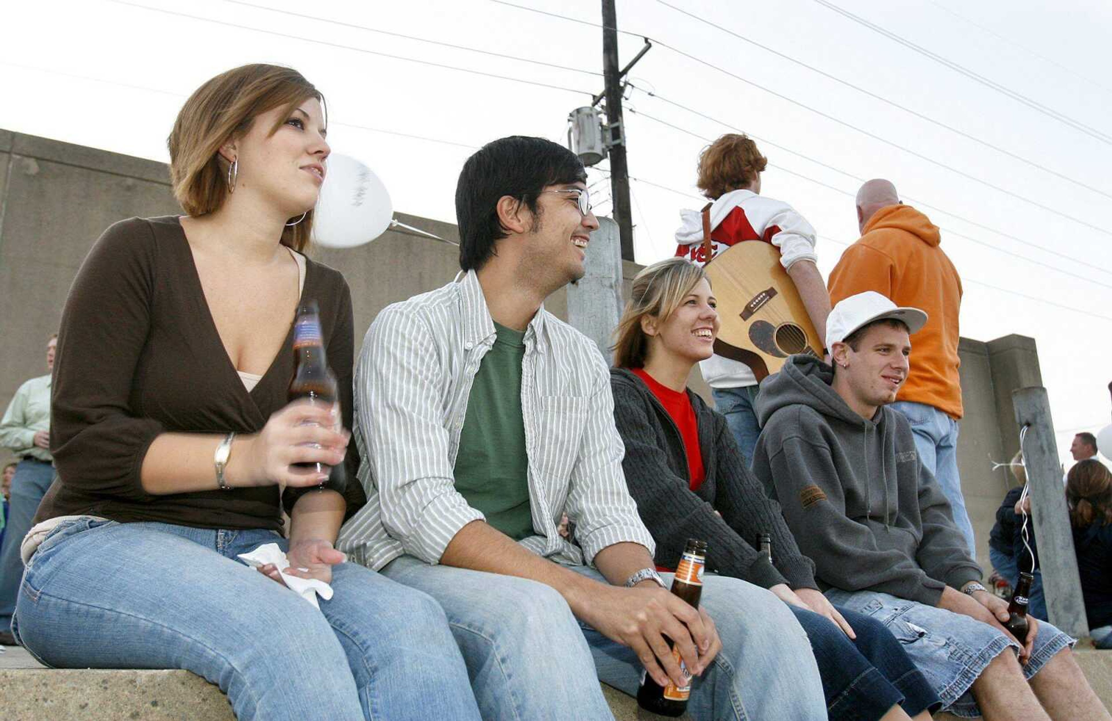 ELIZABETH DODD ~ edodd@semissourian.com
From left, Samantha Richardson of Cape Girardeau Jeff Stiebel of Cape Girardeau, Abby Kieninger of Jackson and Kyle Kieninger of Jackson sit by the river Oct. 1 and enjoy food and music at an Emerging Leaders Society United Way event at the riverfront in Cape Girardeau.