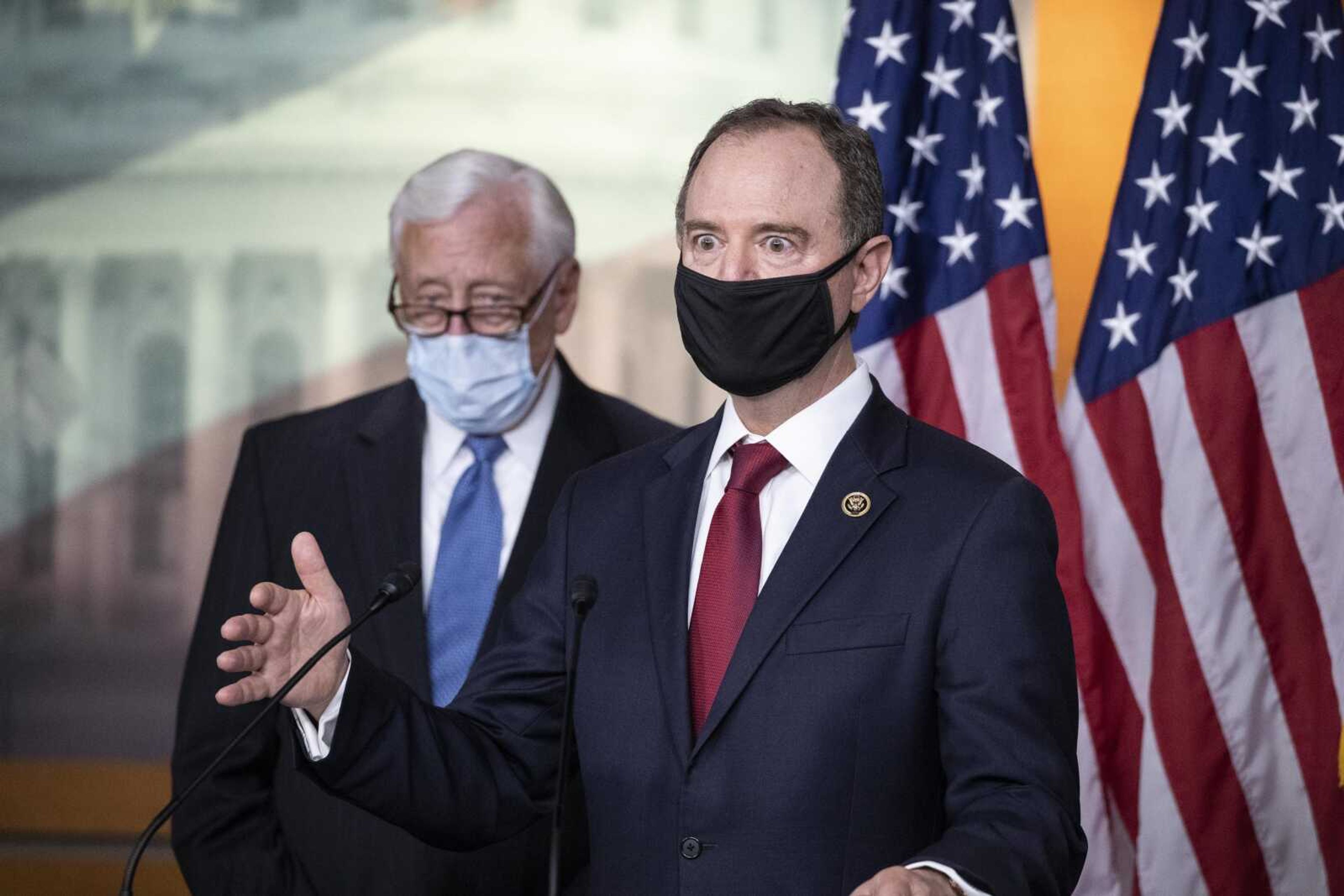 Rep. Adam Schiff, chairman of the House Intelligence Committee, right, speaks accompanied by House Majority Leader Steny Hoyer during a news conference on Capitol Hill on Tuesday<br>in Washington.