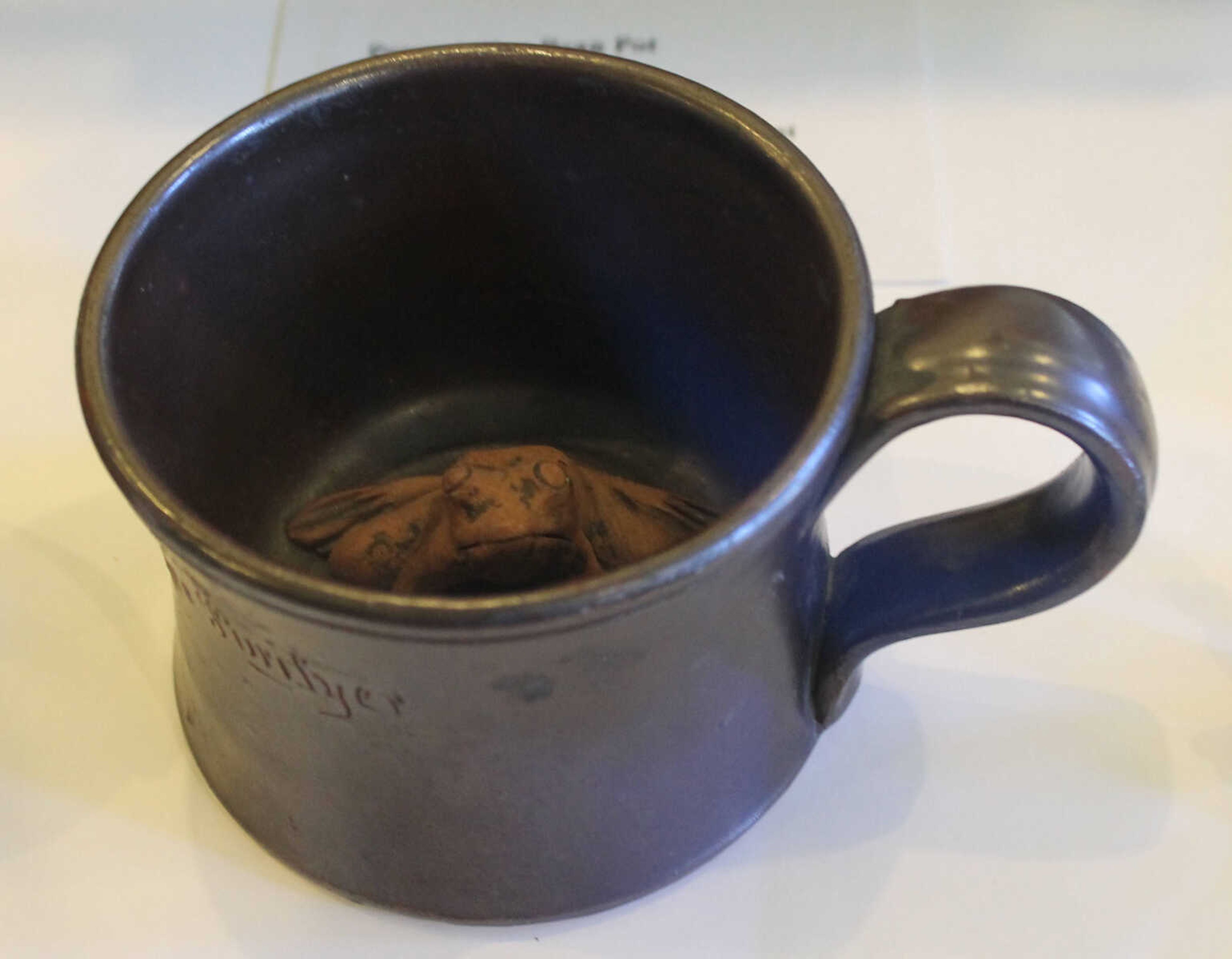 Emily Priddy ~ epriddy@semissourian.com
An Anna Pottery mug is on display March 10, 2017, at the Union County Museum in Cobden, Illinois. The mug was fashioned with a ceramic frog in the bottom to surprise the person drinking from it.