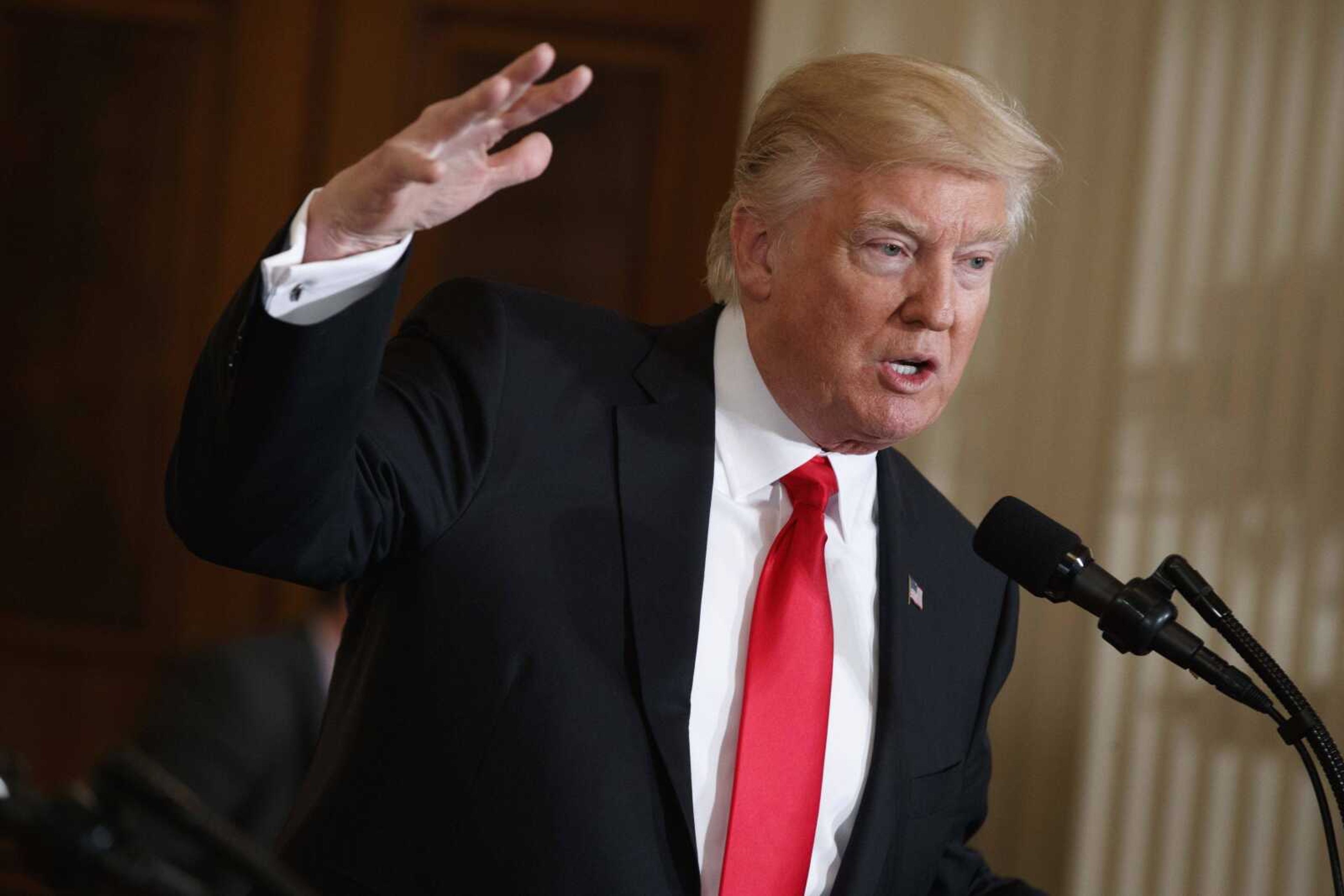 President Donald Trump speaks Friday in the East Room of the White House in Washington.