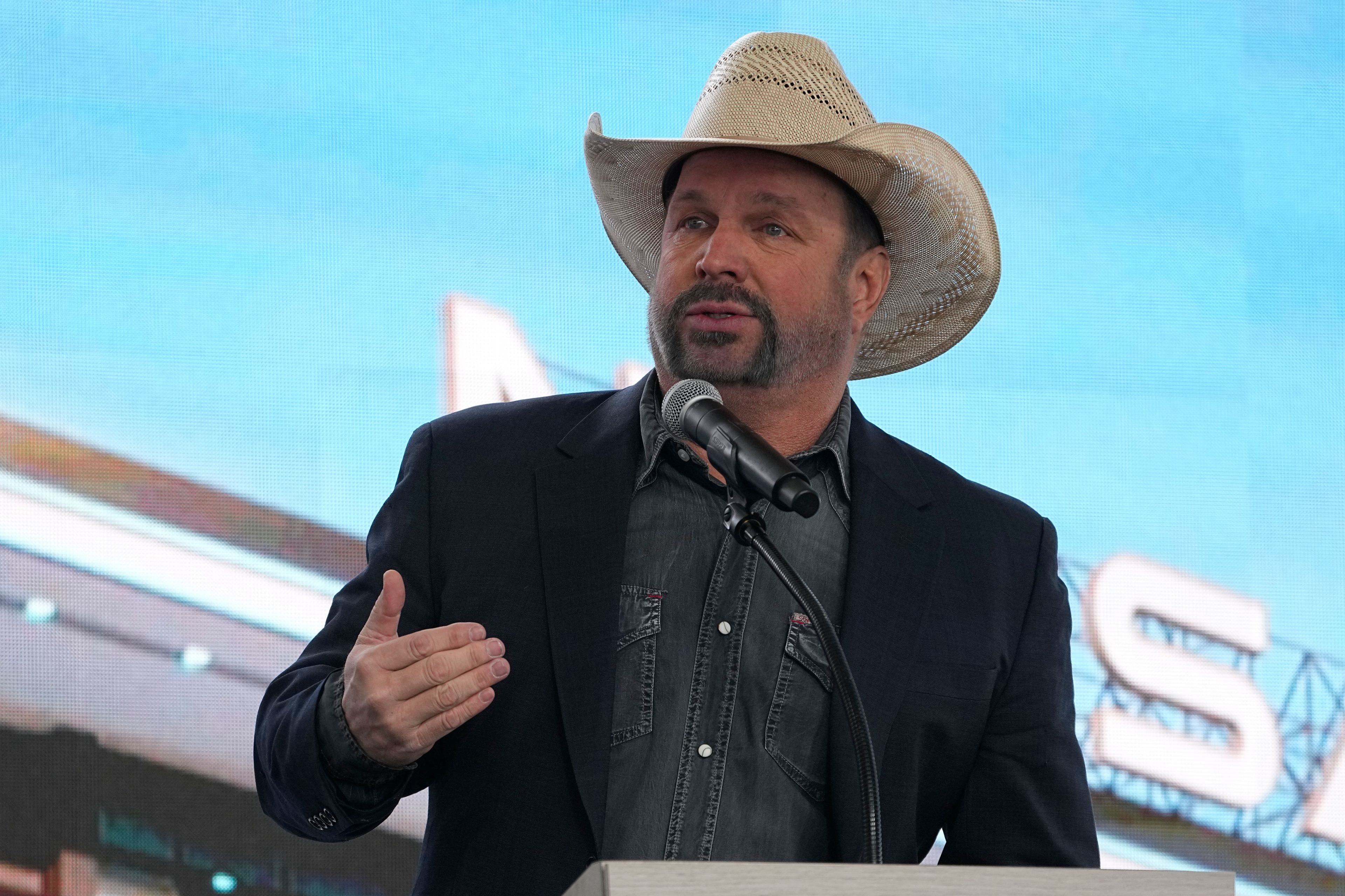 FILE - Garth Brooks speaks during a groundbreaking ceremony for the Tennessee Titans new NFL football stadium, Feb. 29, 2024, in Nashville, Tenn. (AP Photo/George Walker IV, File)