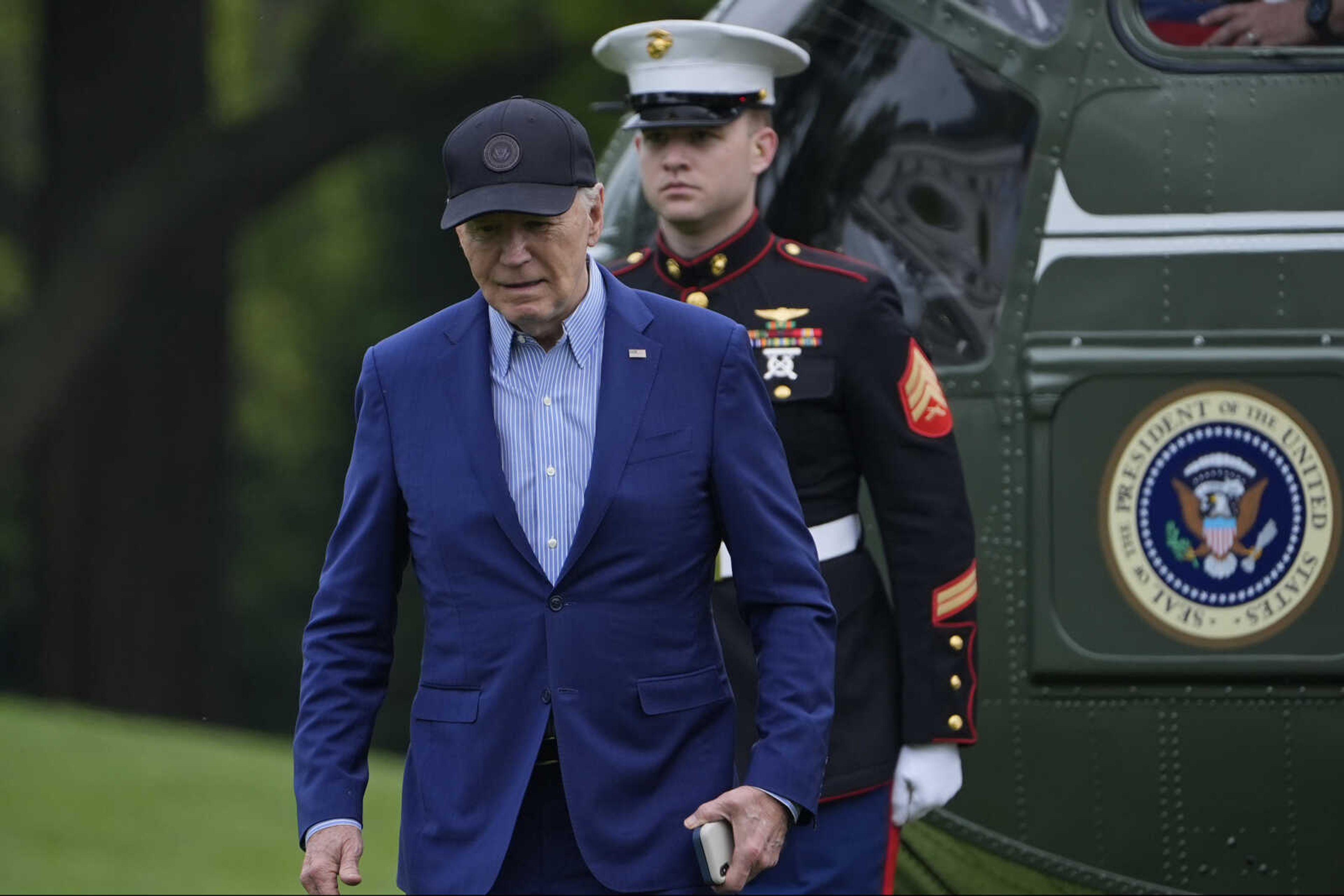 President Joe Biden steps off of Marine One and walks across the South Lawn of the White House in Washington, Wednesday, April 17, 2024, after returning from a trip to Pennsylvania. (AP Photo/Susan Walsh)