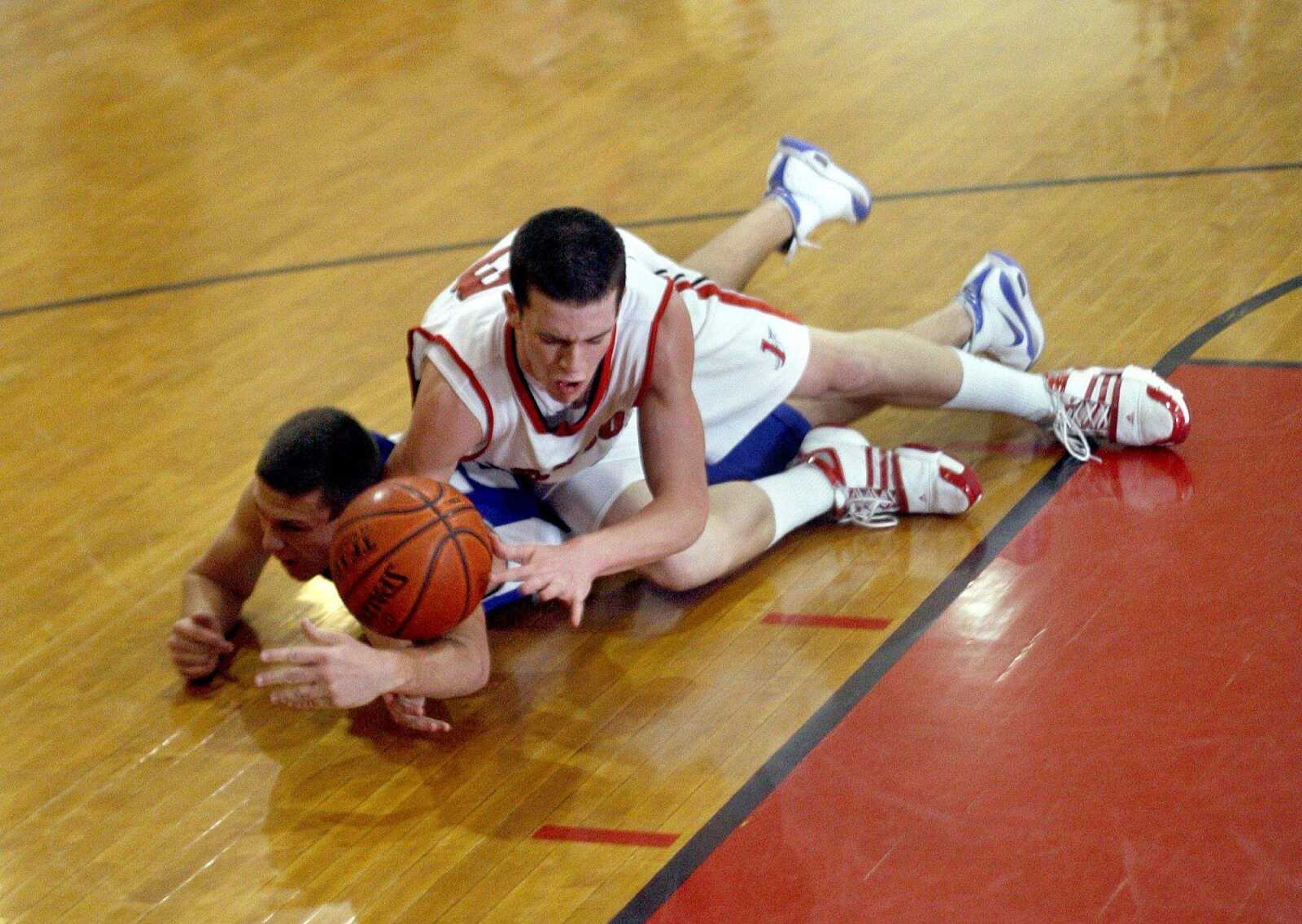 ELIZABETH DODD ~ edodd@semissourian.com
Notre Dame's John Unterreiner, left, and Jackson's Zach McDowell collide while fighting for the ball Friday night at Jackson.