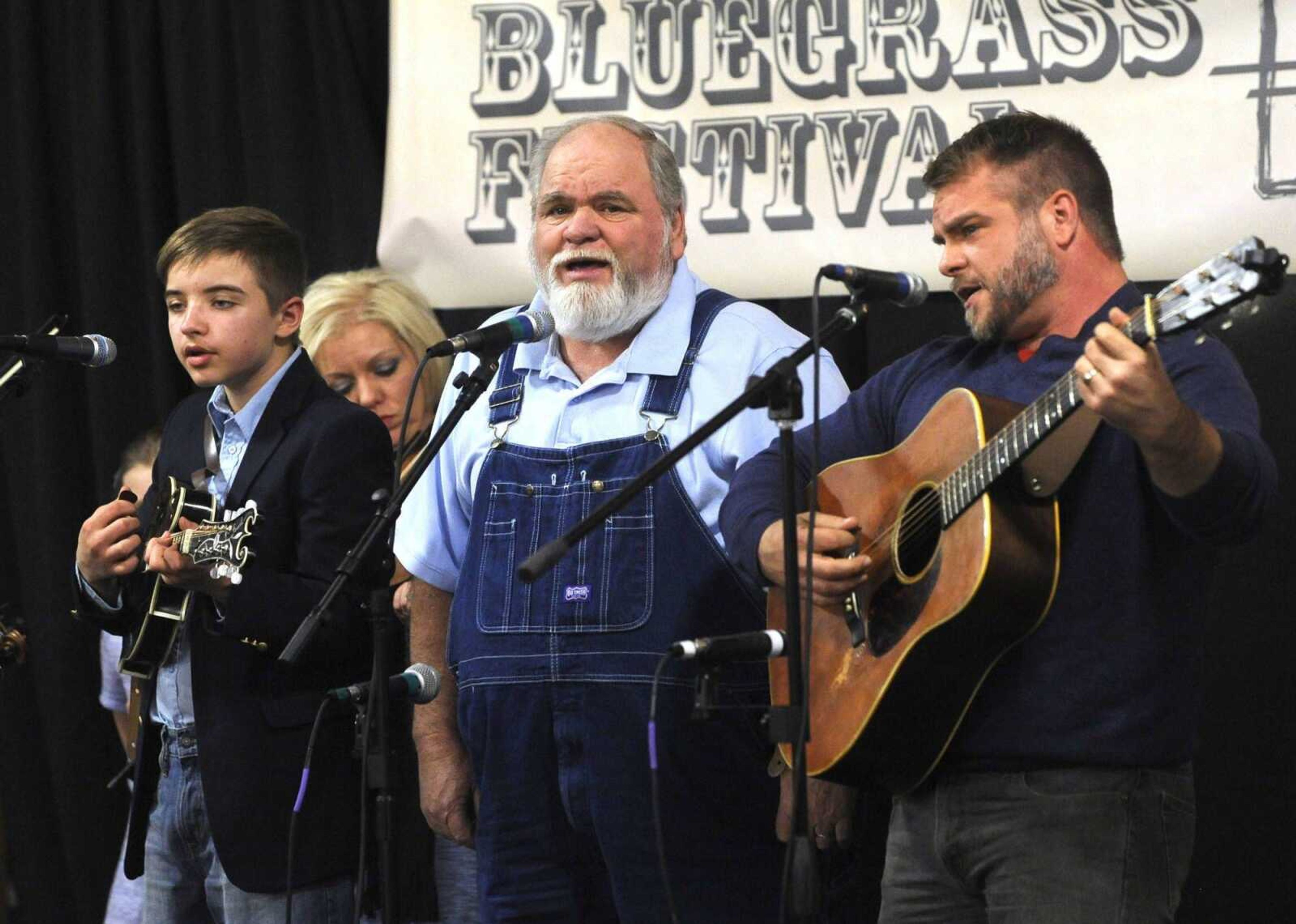 Members of the Gipsons, Sawyer, left, Dwayne and Brad, perform "I'll Be Young Again" at the Bootheel Bluegrass Festival in January 2017 at Bavarian Halle in Fruitland.