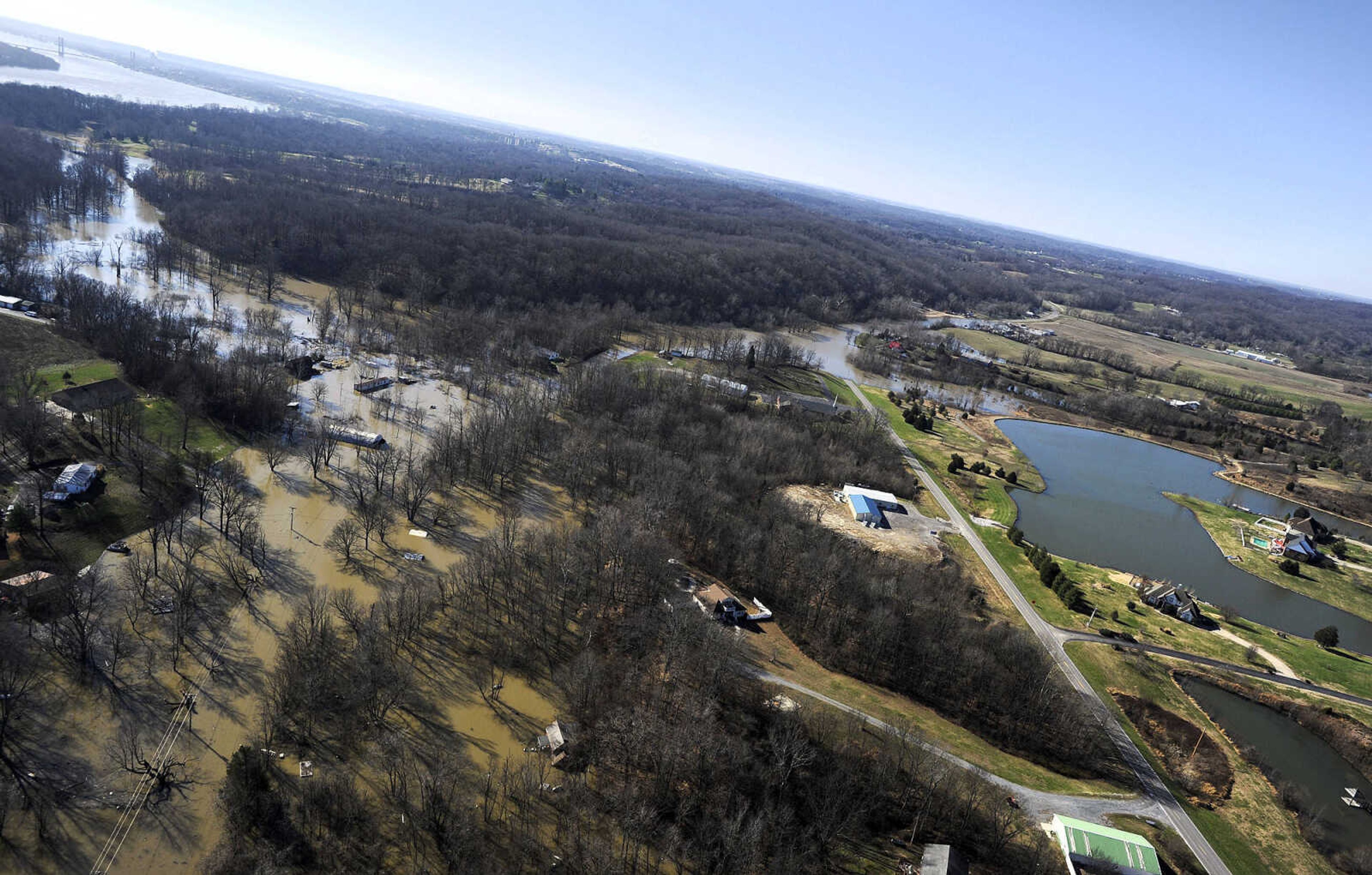 LAURA SIMON ~ lsimon@semissourian.com

The swollen Mississippi River is seen a portion of Highway 177 and the surrounding areas in Cape Girardeau, Saturday, Jan. 2, 2016.