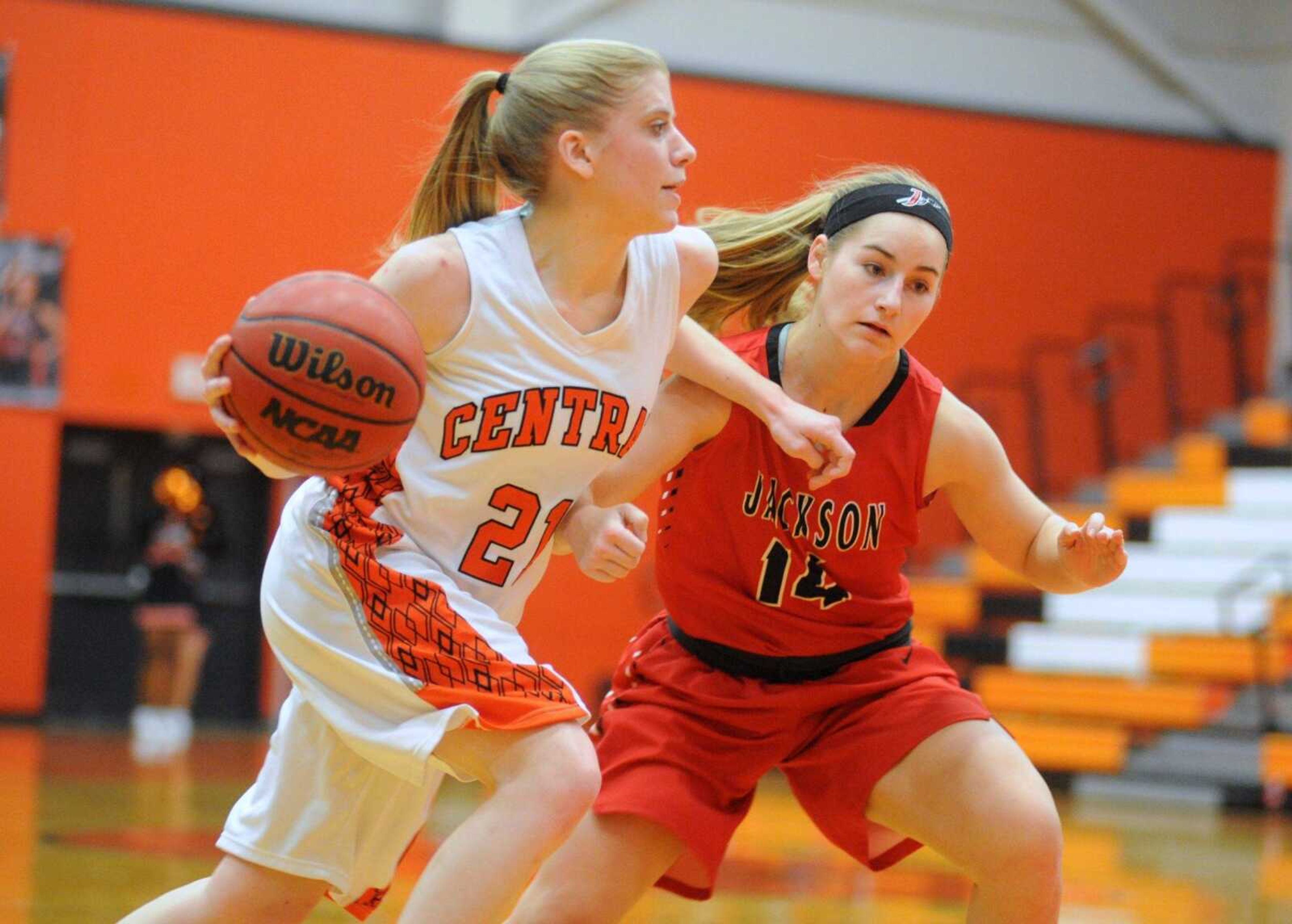 Cape Central's Kassidy Pannier drives past Jackson's Nikki Sotak during the second quarter Tuesday, Jan. 14, 2016 at Cape Central High School. (TRENT SINGER)