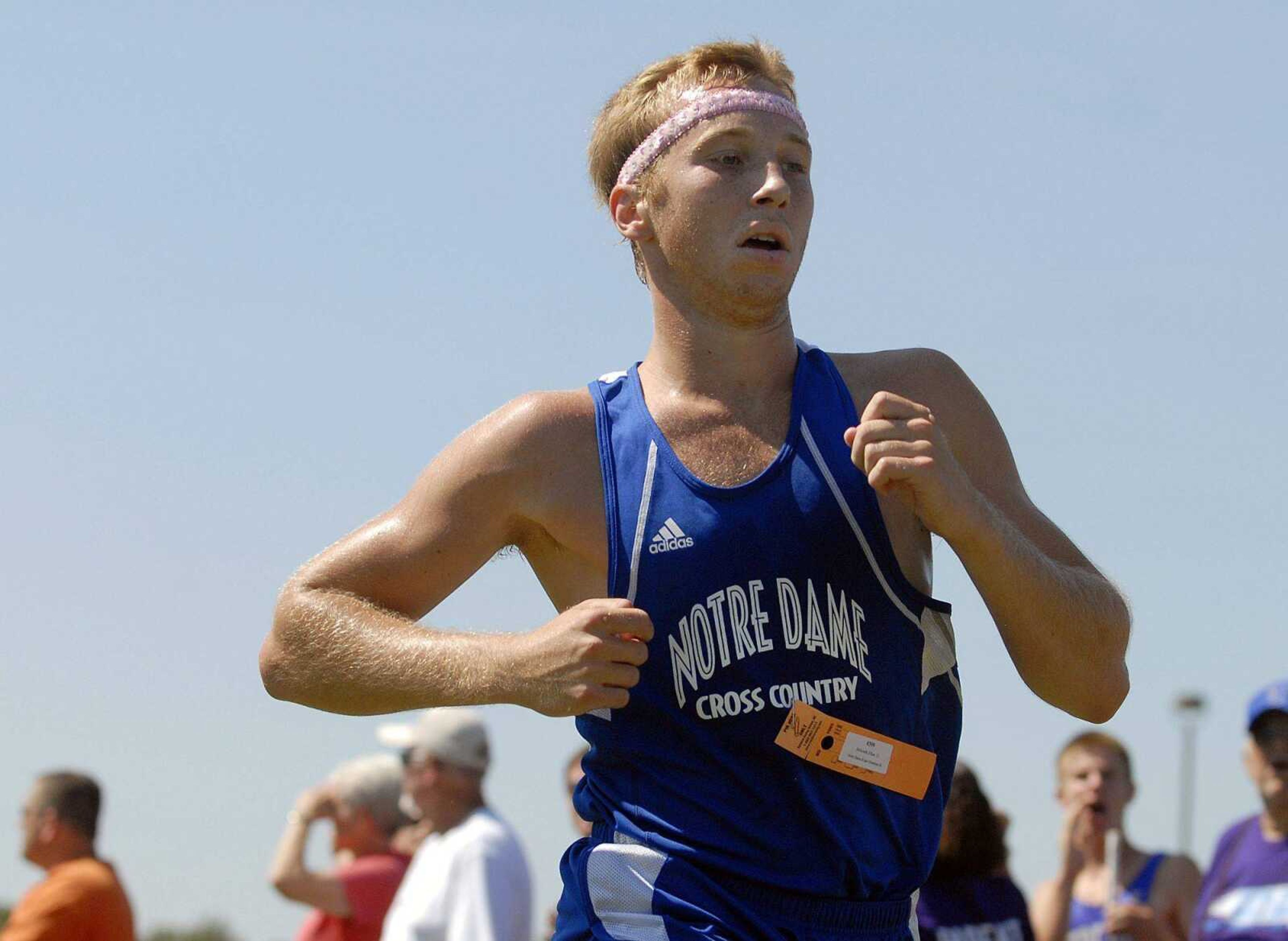 Notre Dame senior Ethan Holcomb crosses the finish line Saturday.