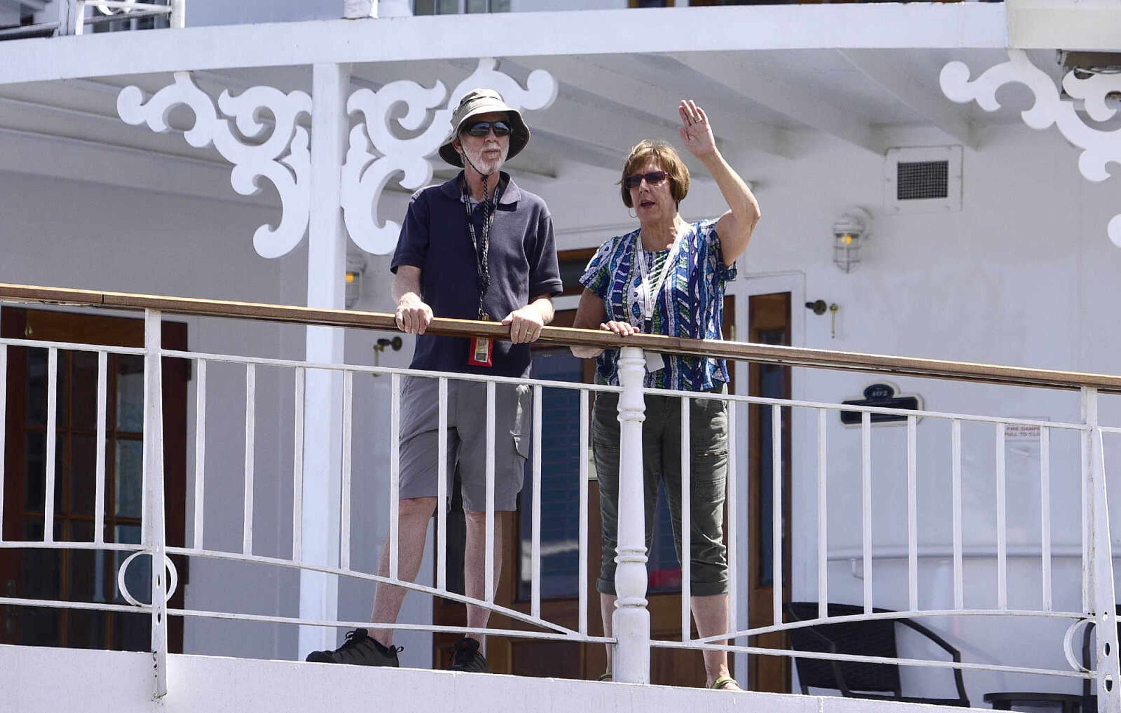 Passengers on the American Queen take in the from the deck as the riverboat prepares to depart Riverfront Park on Wednesday, Aug. 23, 2017, in downtown Cape Girardeau.