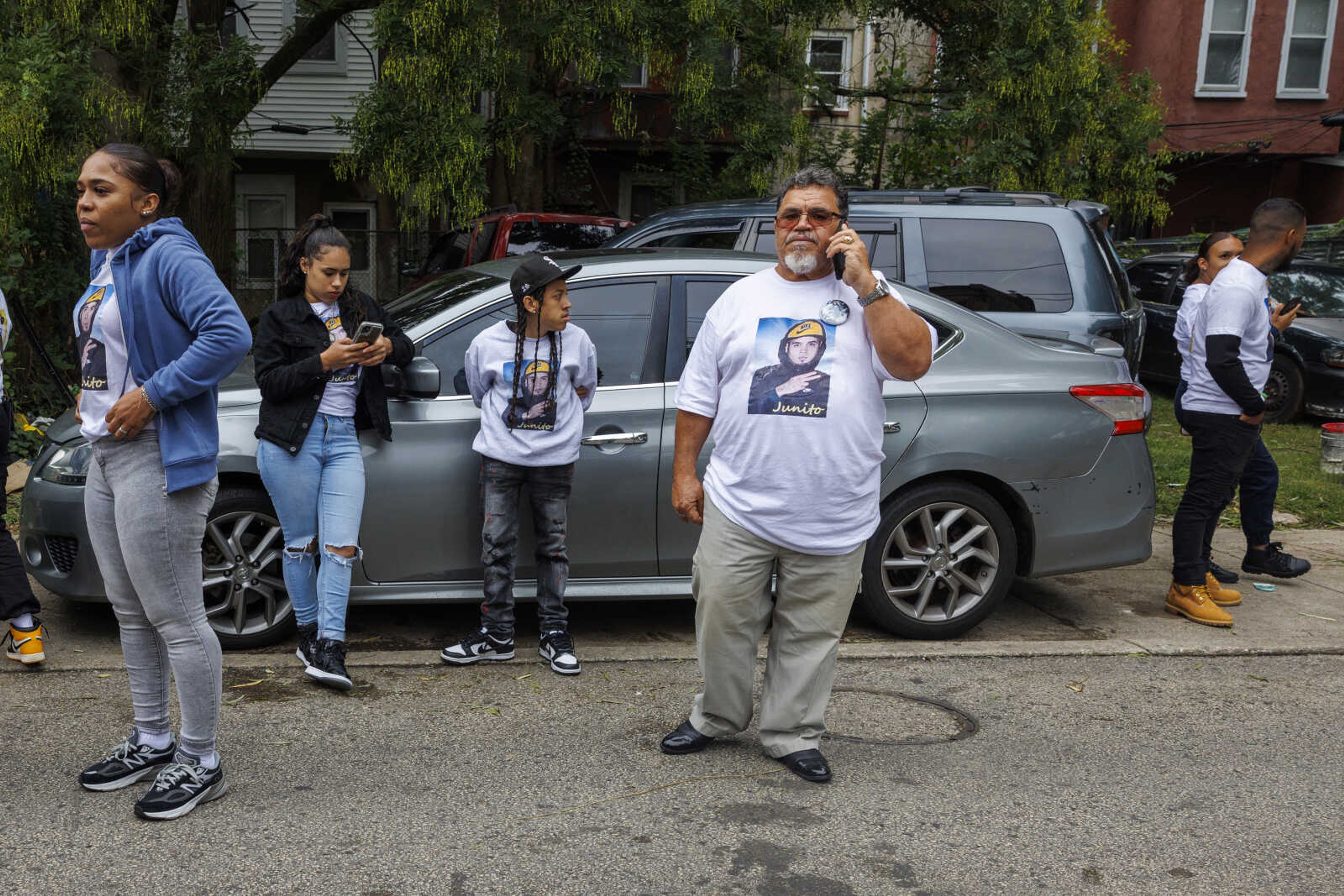 Family of Eddie Irizarry gather outside the Philadelphia home after learning charges were dropped against Philadelphia Police officer Mark Dial, Tuesday, Sept. 26, 2023. A judge has dismissed all charges, including a murder count, against Dial, a Philadelphia police officer who shot and killed Irizarry, a driver. The judge ruled Tuesday after watching video of the fatal shooting of 27-year-old Irizarry by Officer Dial.  (Alejandro A. Alvarez/The Philadelphia Inquirer via AP)