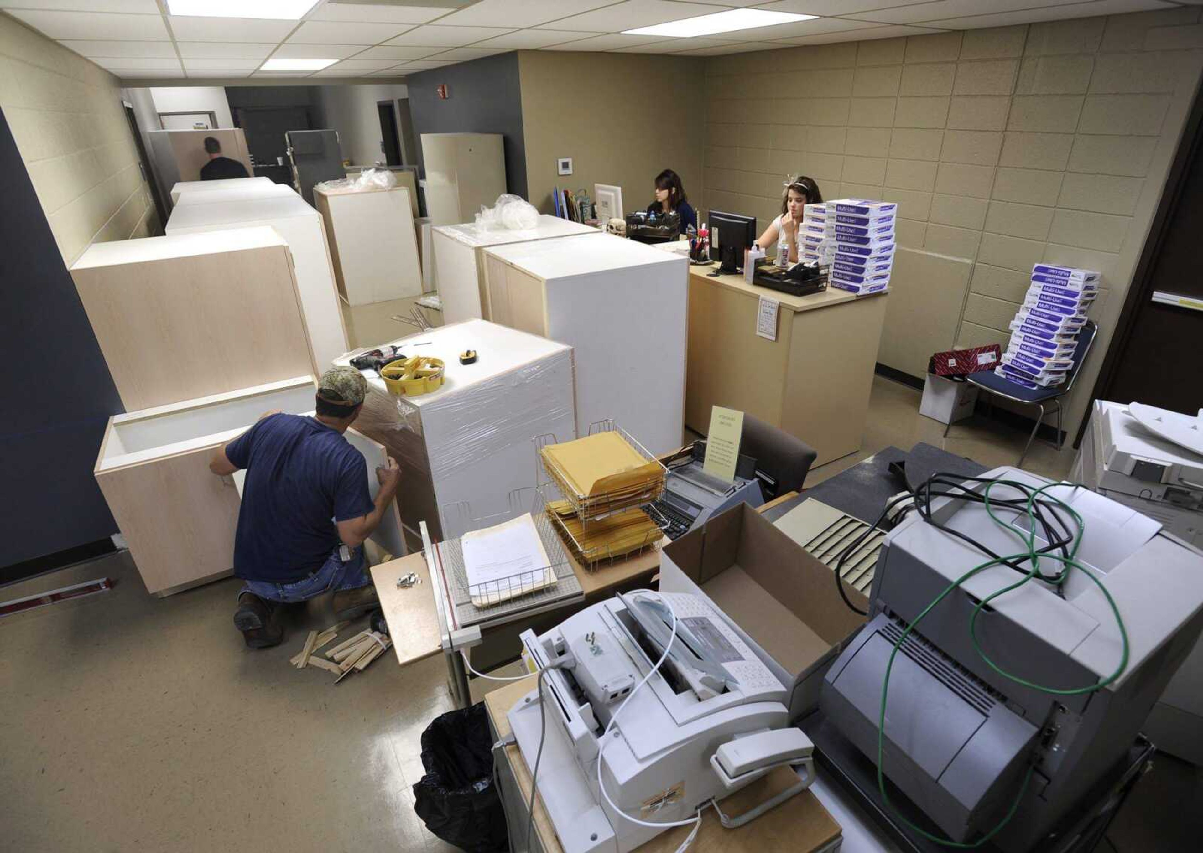 Lock-up file cabinets for records and evidence are assembled in the new headquarters building for the Department of Public Safety at Southeast Missouri State University. The building at 1146 N. Sprigg Street was the university's alumni center. (Fred Lynch)