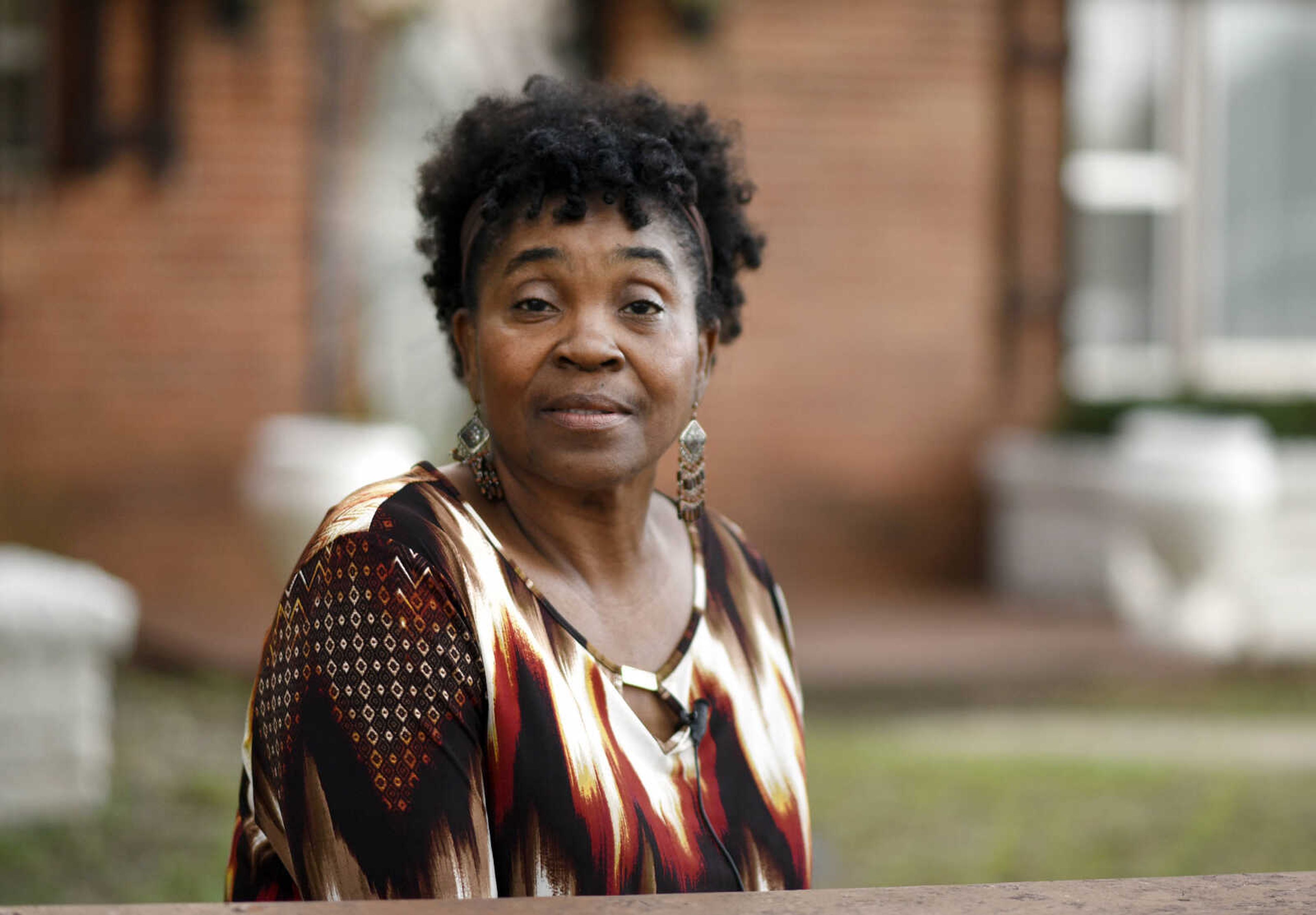 LAURA SIMON ~ lsimon@semissourian.com

Agnes Mason poses for a portrait outside the house at 333 Dixie Street in Sikeston, Missouri in September. Mason was at the house for a fish fry on the night of Aug. 5, 2000.