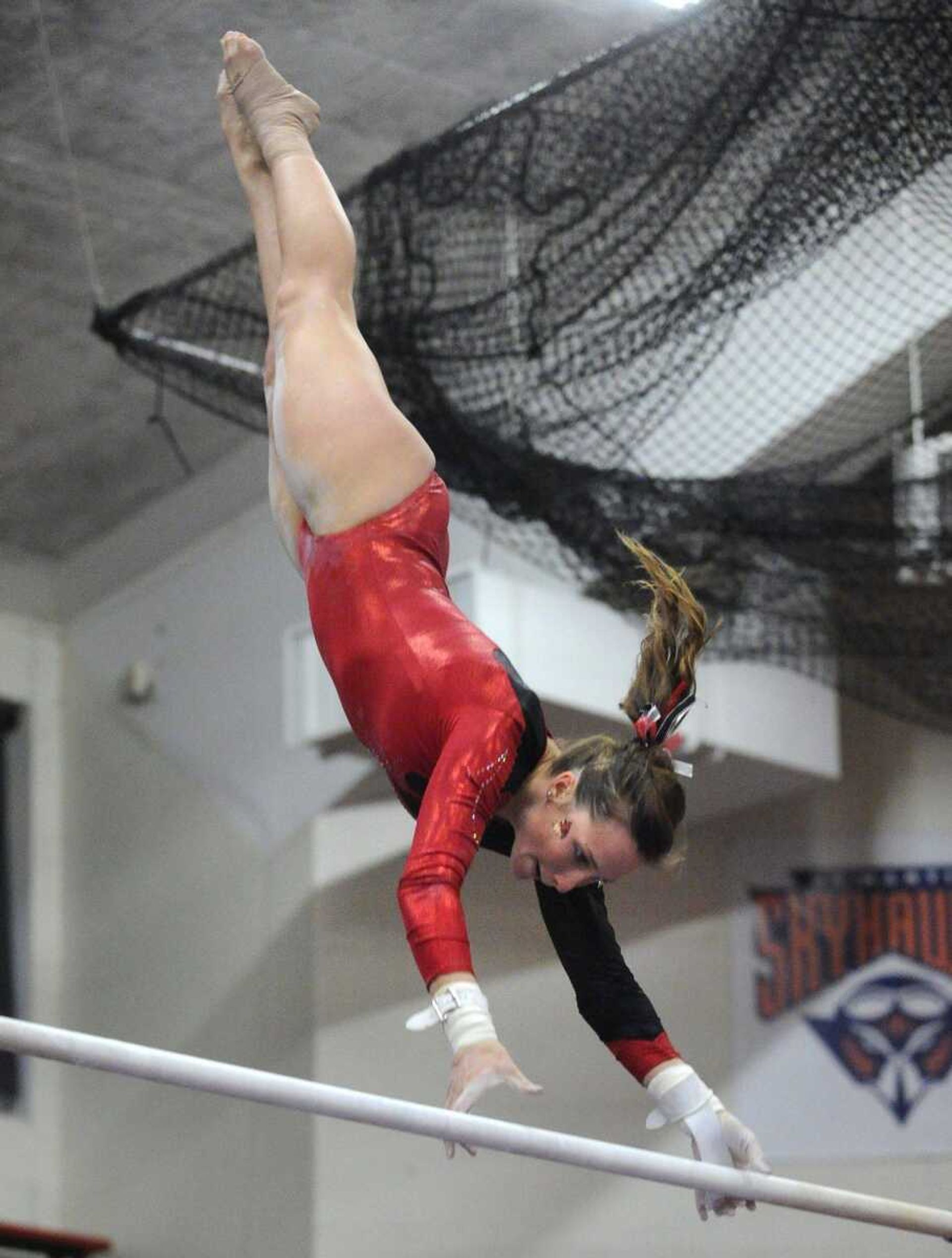 Southeast Missouri State's Angela Serafini competes on the uneven bars during Friday's meet at Houck Field House.