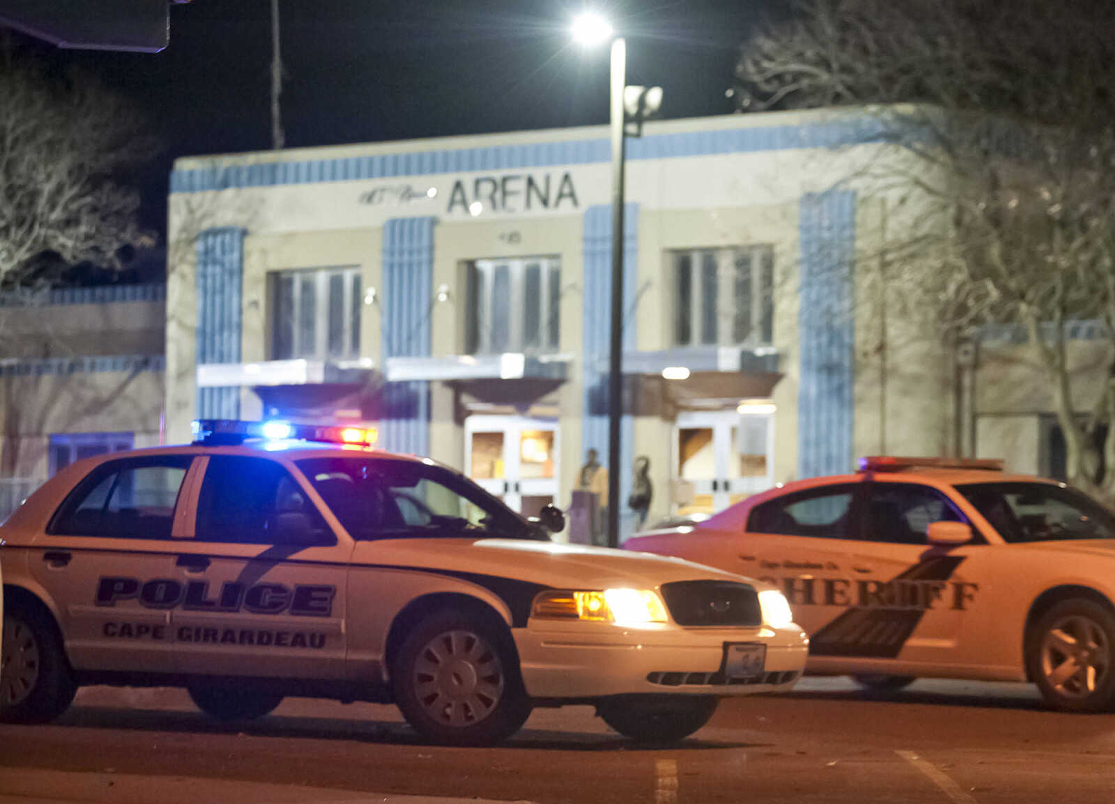 Law enforcement vehicles sit outside of the Arena Building
after a shooting Saturday night in Cape Girardeau. (Adam Vogler)