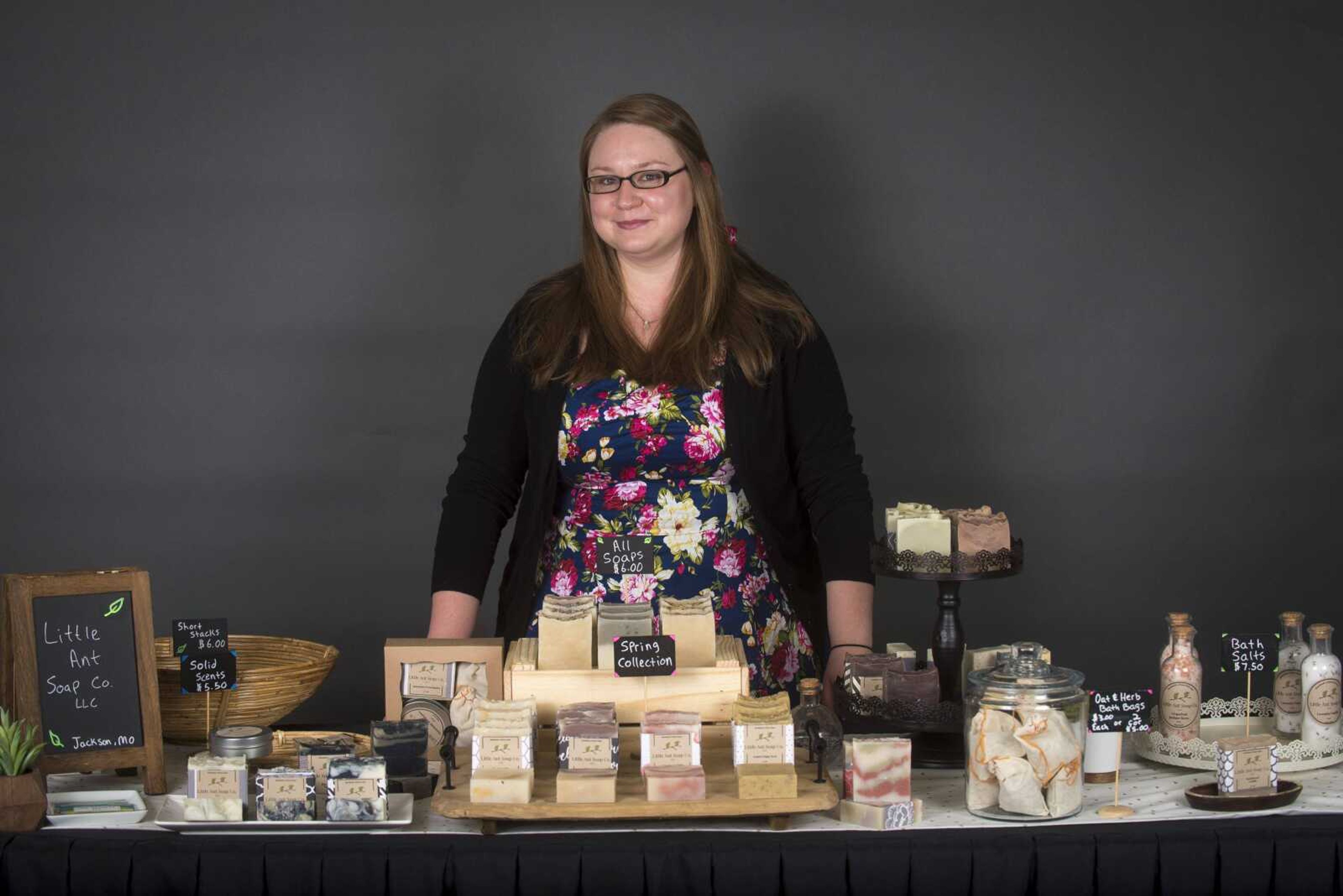 Autumn Abernathy, owner of Little Ant Soap Co. LLC, poses with her homemade soap and bathing products.