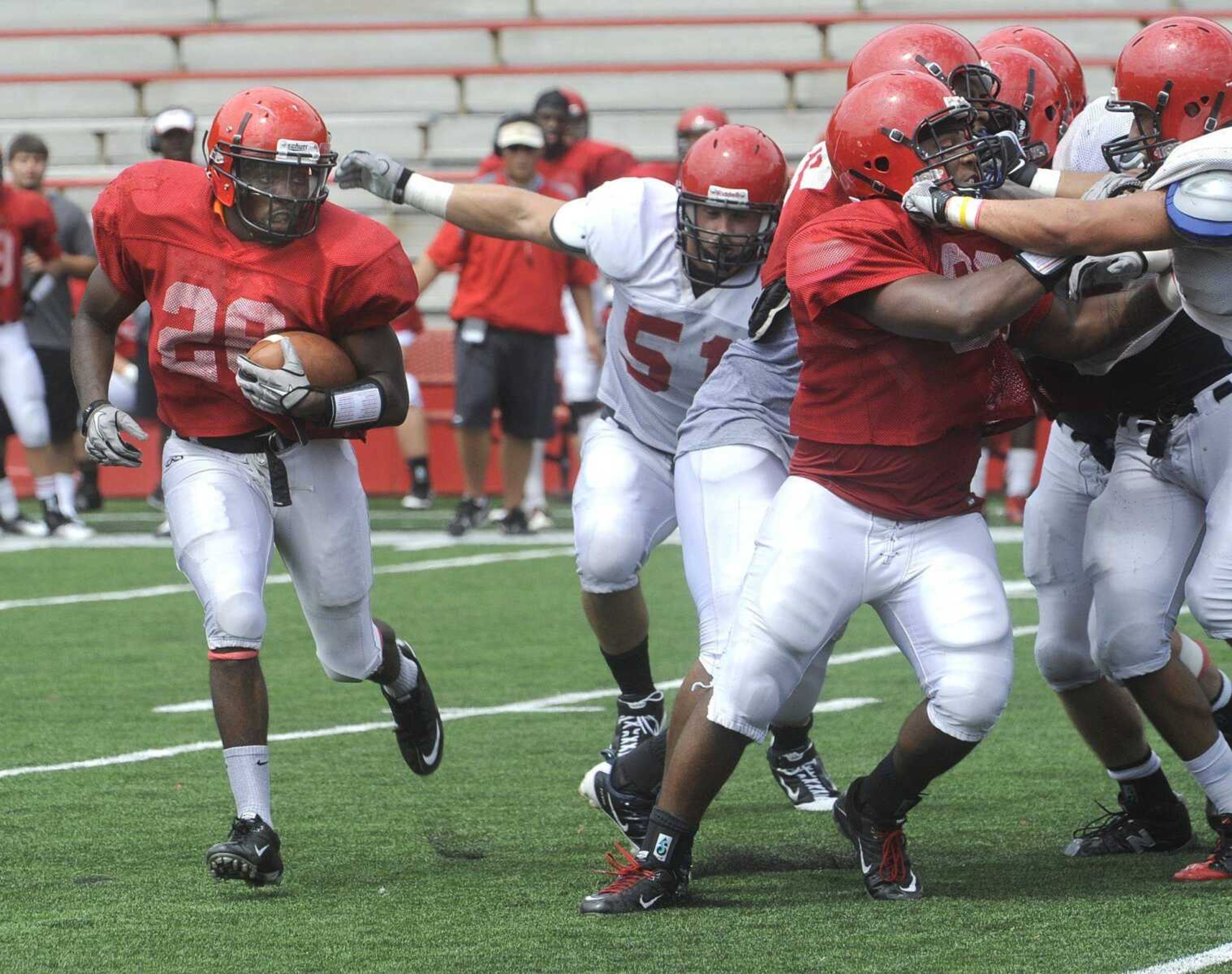 Southeast Missouri State running back Renard Celestin looks for a hole behind the offensive line Saturday.