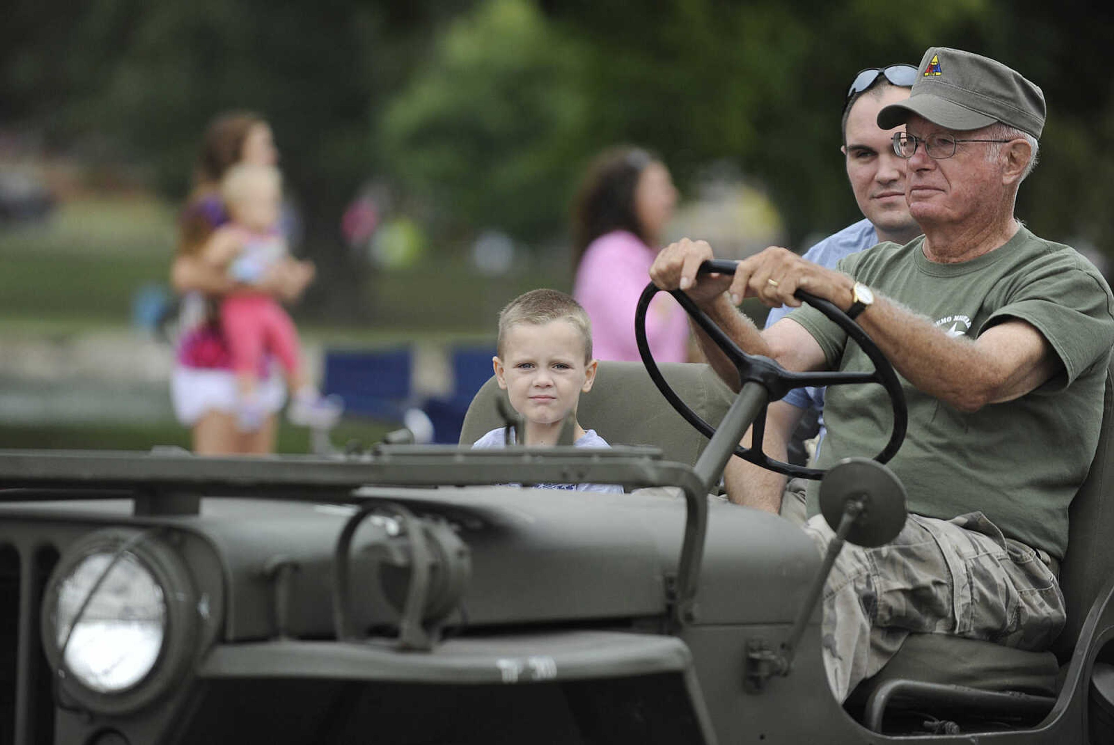 GLENN LANDBERG ~ glandberg@semissourian.com

The SEMO District Fair Parade heads down Broadway after starting in Capaha Park Saturday morning, Sept. 6, 2014, in Cape Girardeau. The parade ended at Arena Park where the 159th annual SEMO District Fair is being held.