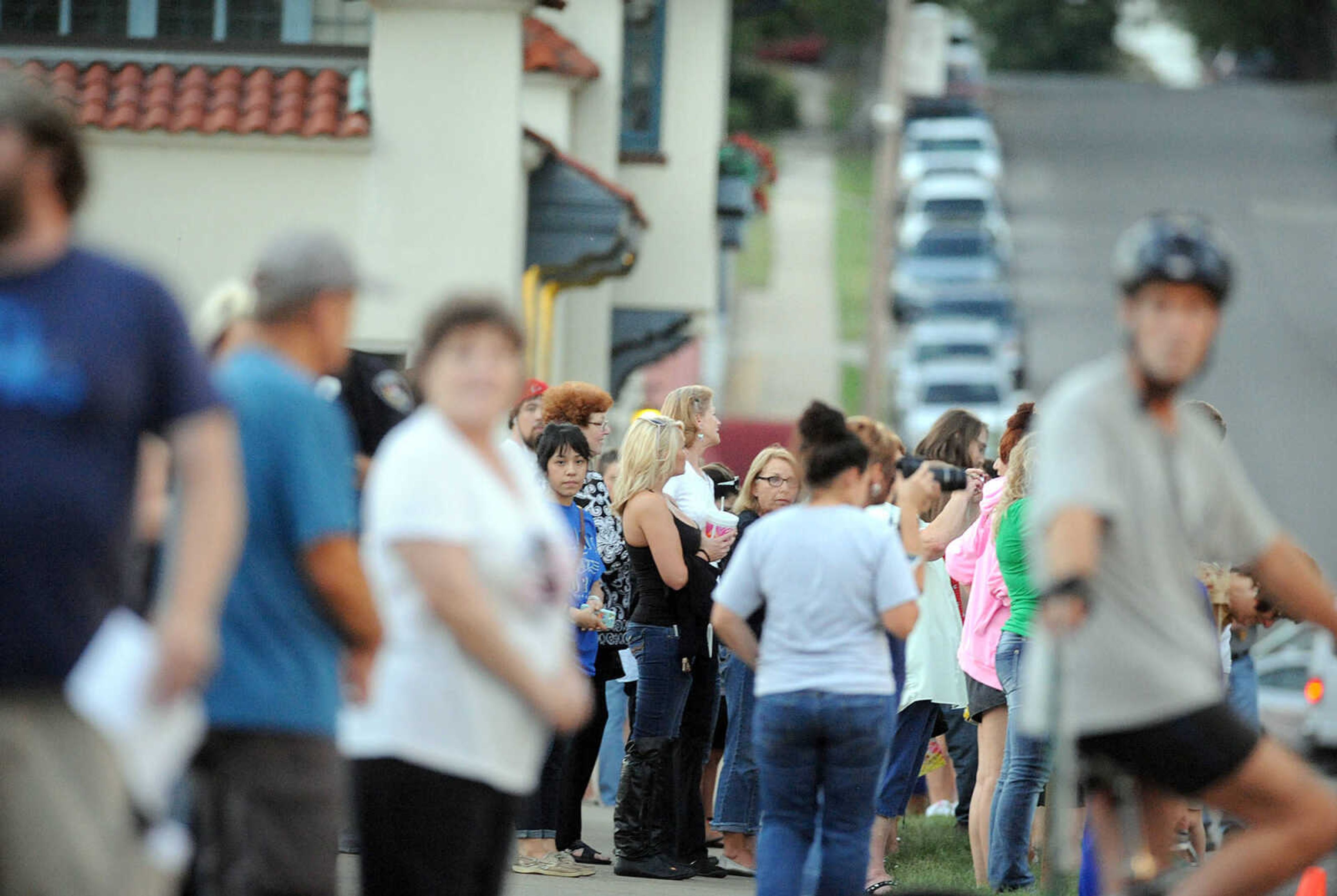 LAURA SIMON ~ lsimon@semissourian.com

Onlookers line Lorimier Street as filming for 20th Century Fox's feature film "Gone Girl" gets underway at the Common Pleas Courthouse, Thursday, Oct. 3, 2013, in Cape Girardeau.