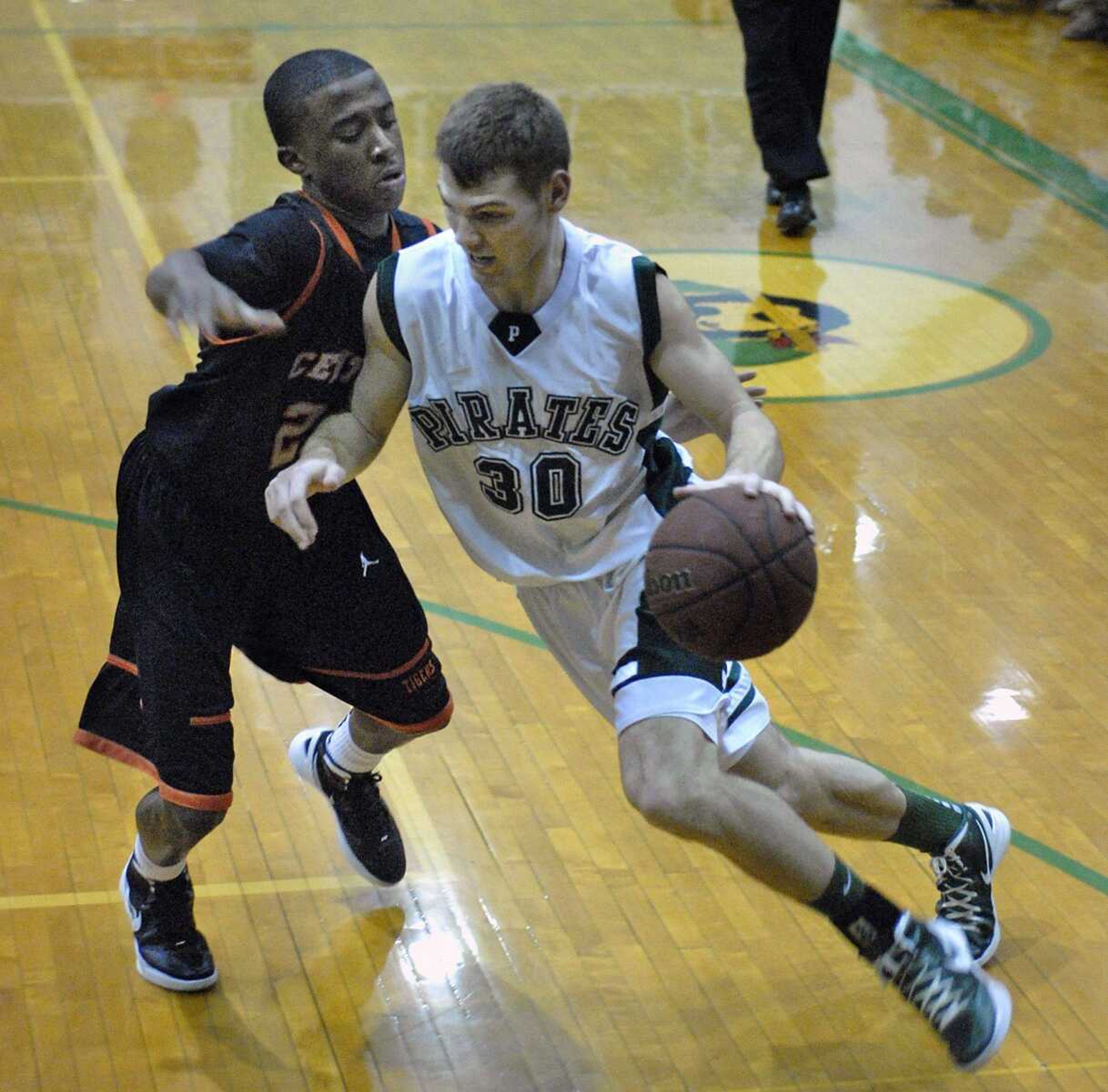 Perryville&#8217;s Bryce Weibrecht drives against Central&#8217;s Garan Evans during the third quarter Wednesday in Perryville , Mo. (Kristin Eberts)