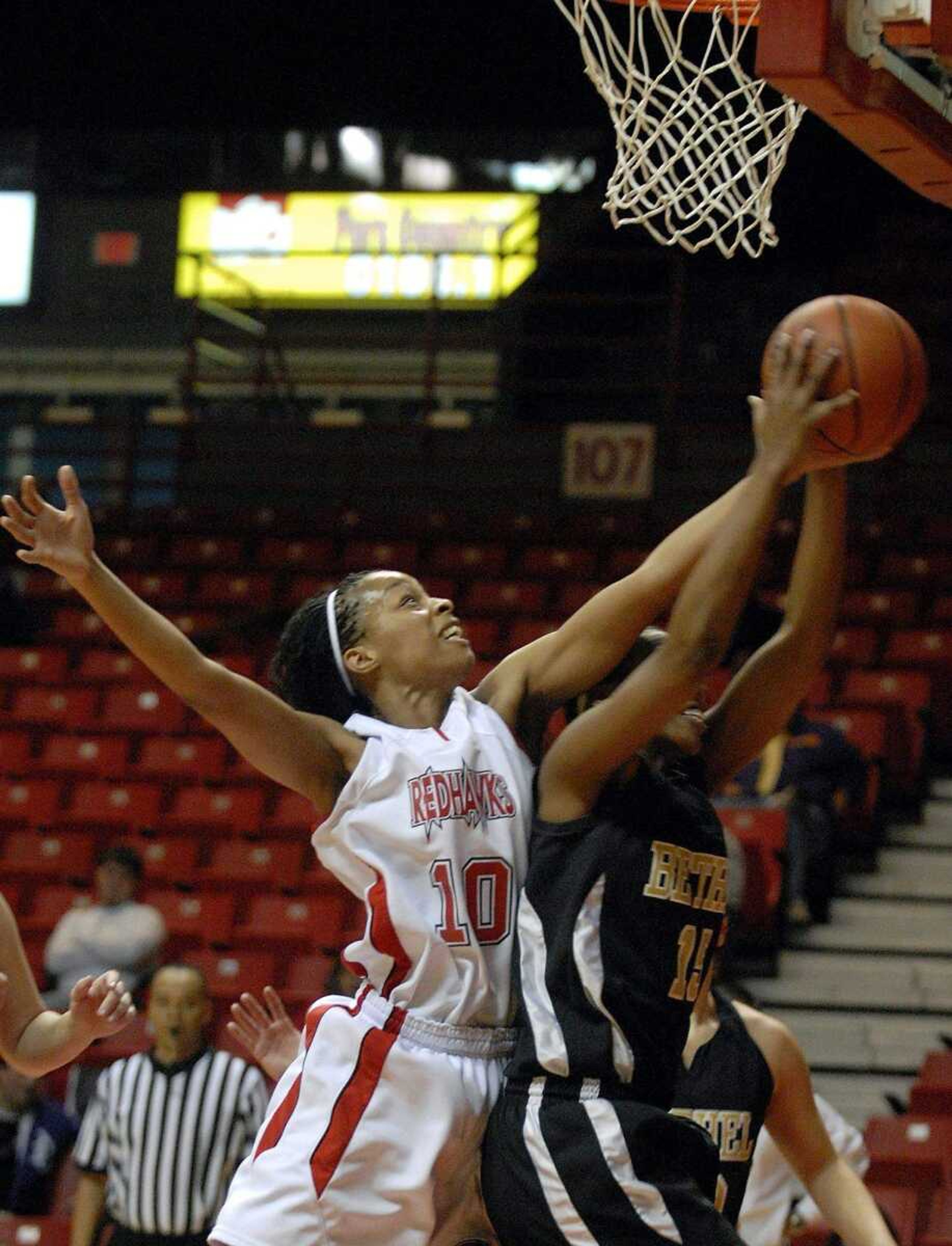 ELIZABETH DODD ~ edodd@semissourian.com
Southeast Missouri State's Crysta Glenn, left, fights for the rebound against Bethel's Teena Carter in first half at the Show Me Center Wednesday.