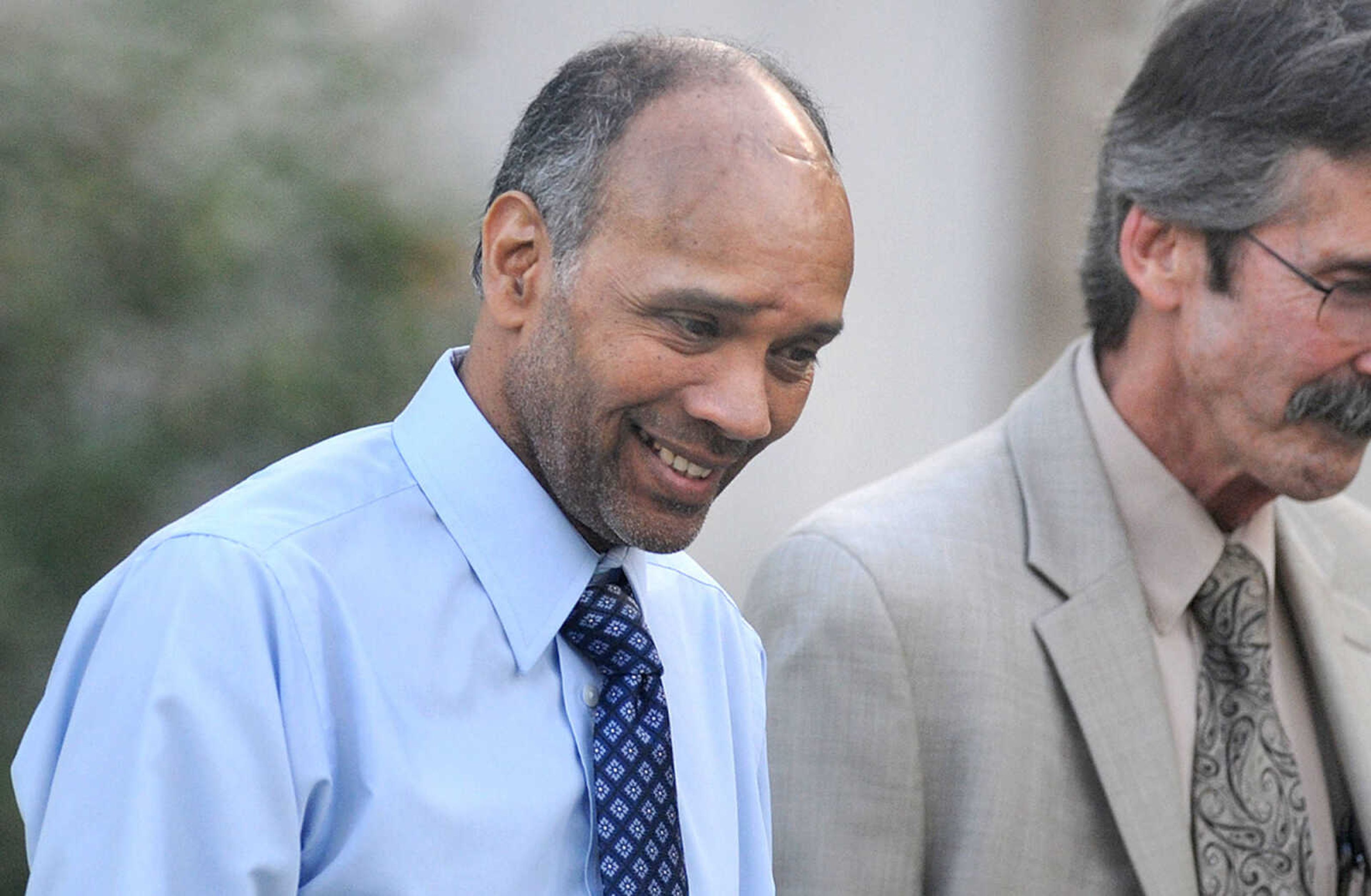 LAURA SIMON ~ lsimon@semissourian.com

George Joseph, left, is escorted from the Cape Girardeau Courthouse in Jackson, following the first day of his double-murder trial, Monday, July 20, 2015. Joseph is accused in the 2013 shooting deaths of his wife, Mary Joseph, and son, Matthew Joseph, at their home on West Cape Rock Drive.