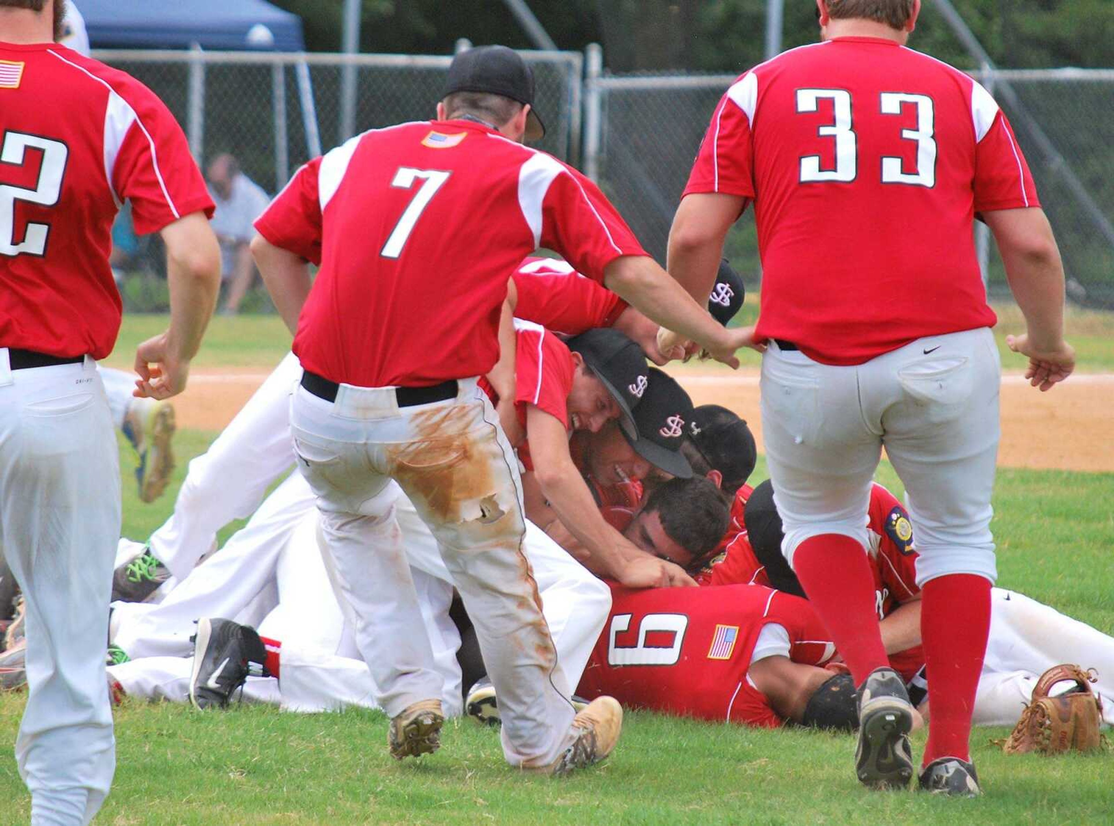 Jackson Legion Post 158 celebrates after defeating Cape Girardeau Ford and Sons Post 63 in the District 14 Senior American Legion tournament Saturday in Sikeston. (Trent Singer)