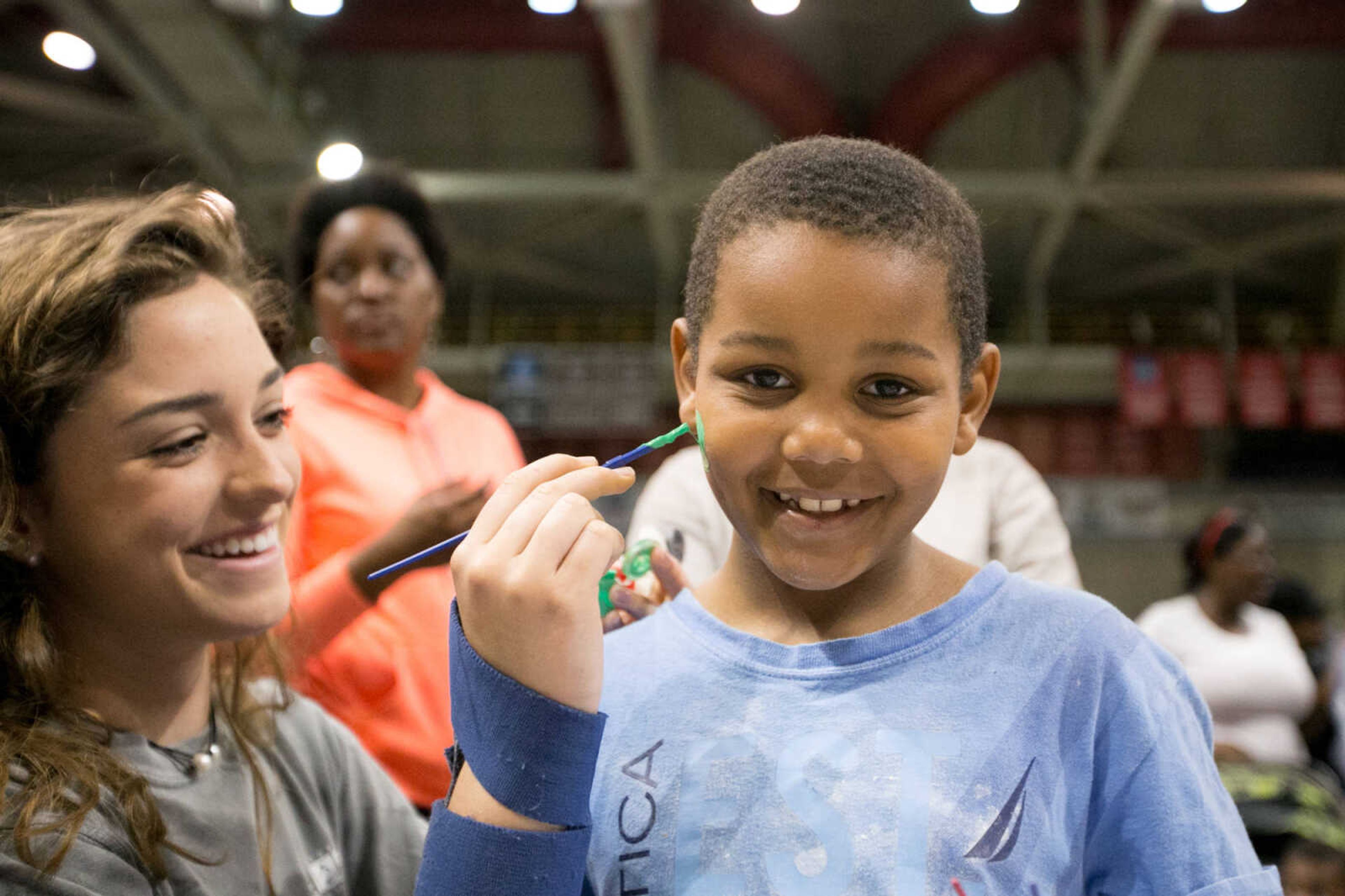 GLENN LANDBERG ~ glandberg@semissourian.com



Meghan Arpin paints a Ninja Turtles on Austin Waddy's face during the Messy Morning event Saturday, April 30, 2016 at the Show Me Center.